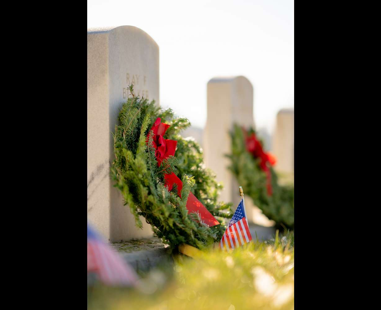 Wreaths are laid on veterans’ graves as part of the Wreaths Across America program at the Salt Lake City Cemetery in Salt Lake City on Saturday.
