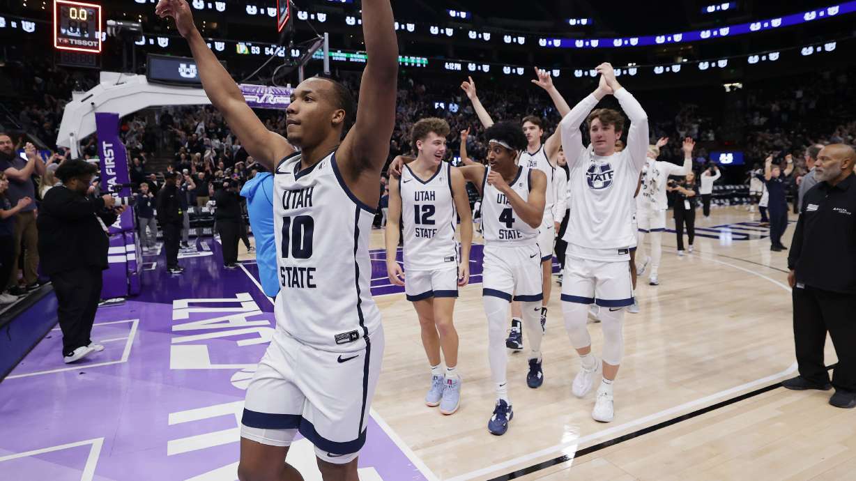 Utah State Aggies guard Darius Brown II (10) celebrates the win over the San Francisco Dons at the Delta Center in Salt Lake City on Saturday, Dec. 16, 2023. USU won 54-53.