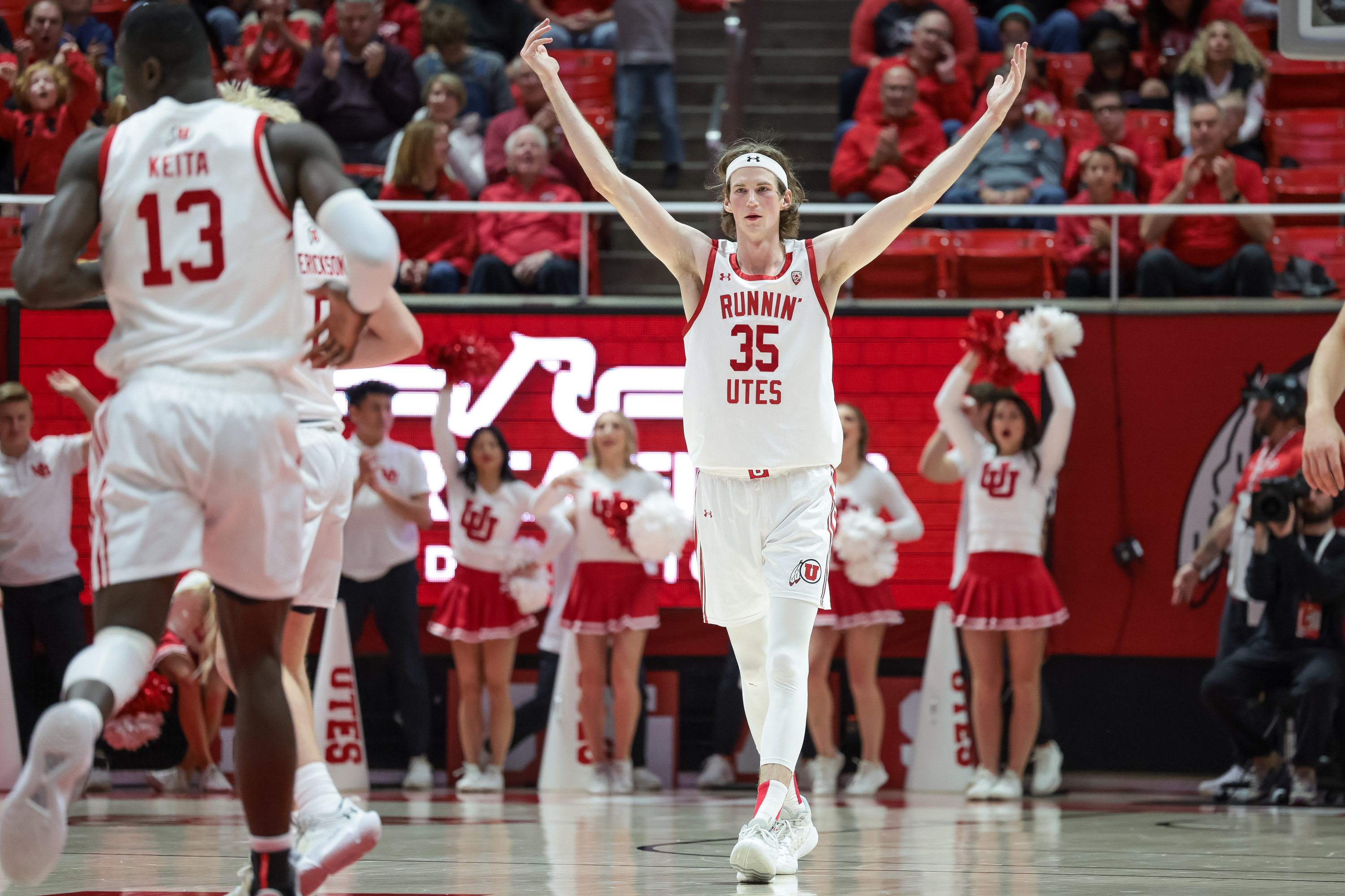 Utah Utes center Branden Carlson (35) hypes up the crowd after sinking a three during the game against the Utah Valley Wolverines at the Huntsman Center in Salt Lake City on Saturday, Dec. 16, 2023.