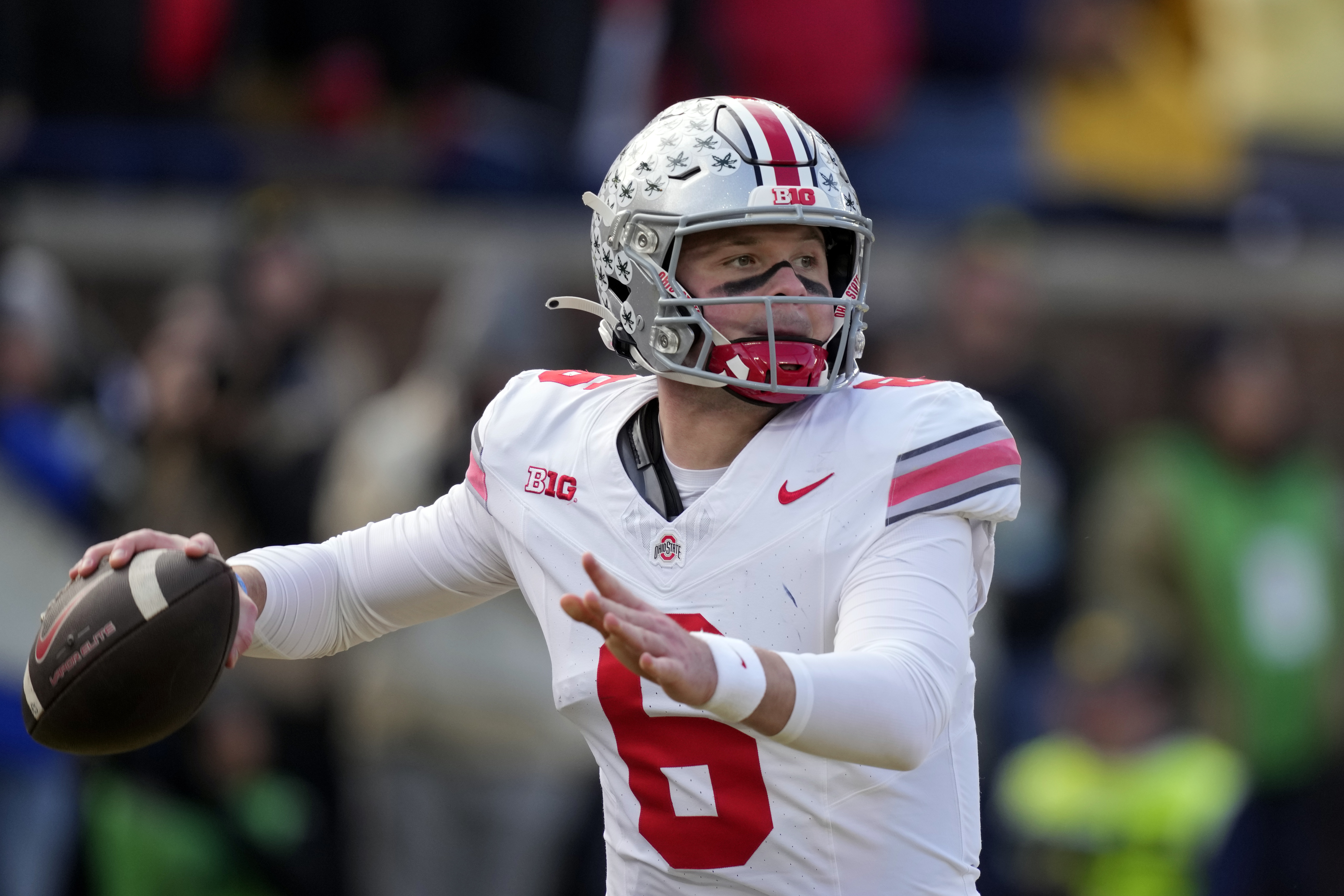 Ohio State quarterback Kyle McCord throws during the first half of an NCAA college football game against Michigan, Saturday, Nov. 25, 2023, in Ann Arbor, Mich. 