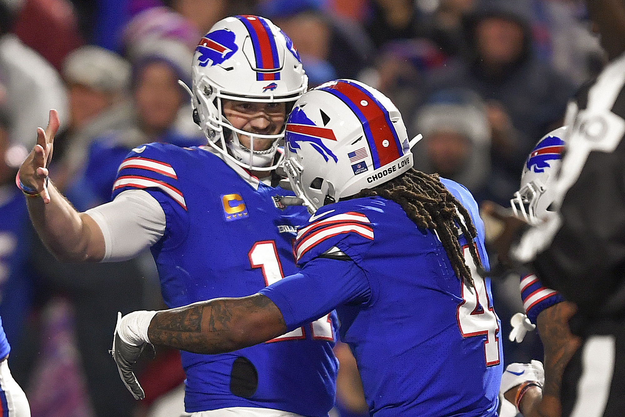 Buffalo Bills running back James Cook (4) celebrates with quarterback Josh Allen (17) after scoring touchdown against the Dallas Cowboys during the second quarter of an NFL football game, Sunday, Dec. 17, 2023, in Orchard Park, N.Y.