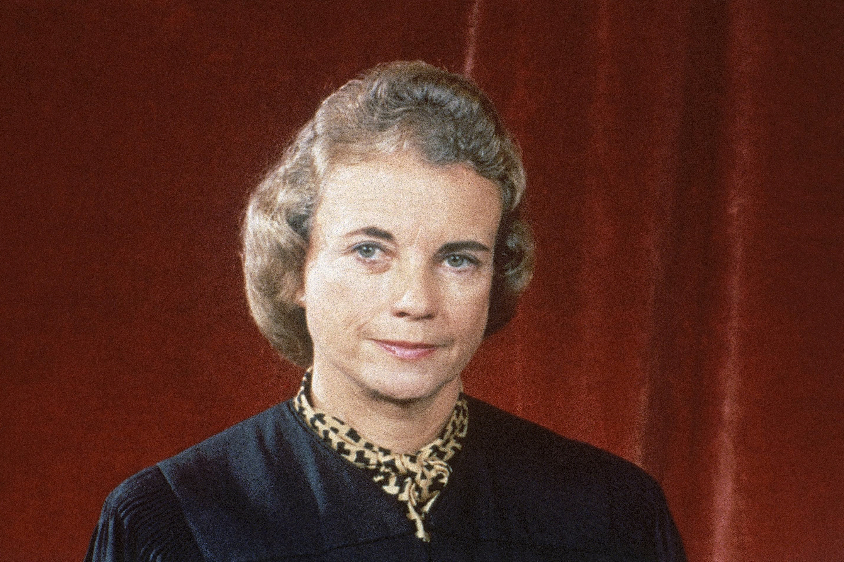 Supreme Court Associate Justice Sandra Day O'Connor poses for a photo in 1982. The late Justice Sandra Day O'Connor lay in repose in the court's Great Hall on Monday.