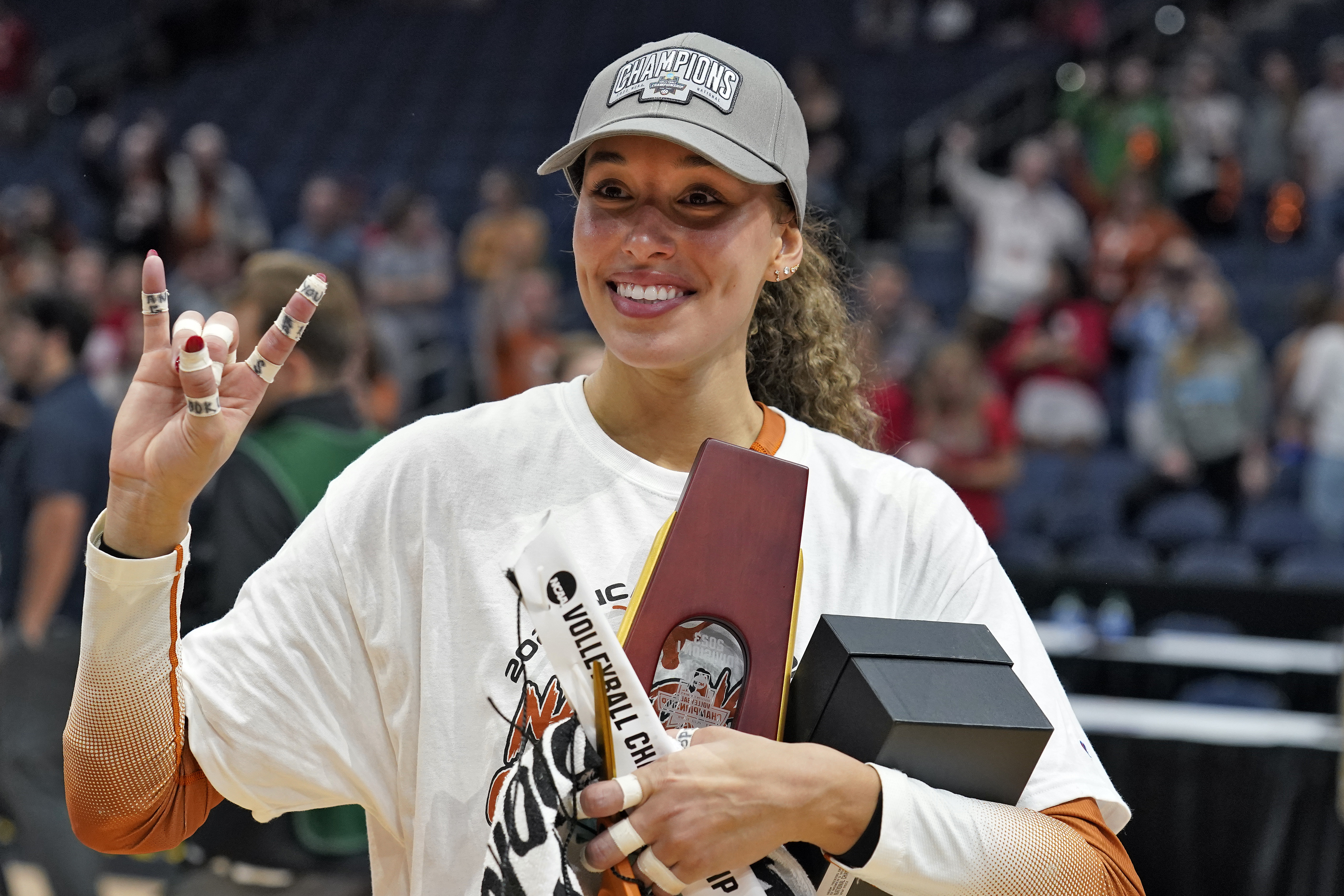 Texas's Madisen Skinner celebrates after the team defeated Nebraska during the championship match in the NCAA Division I women's college volleyball tournament Sunday, Dec. 17, 2023, in Tampa, Fla. 