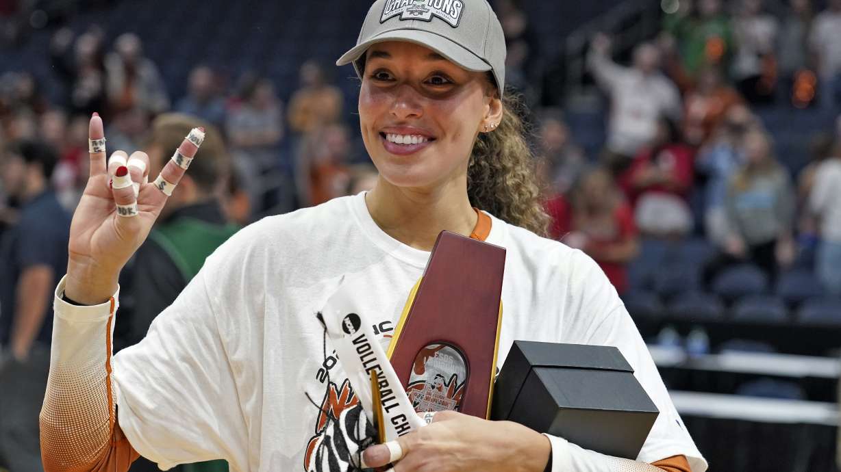 Texas's Madisen Skinner celebrates after the team defeated Nebraska during the championship match in the NCAA Division I women's college volleyball tournament Sunday, Dec. 17, 2023, in Tampa, Fla.