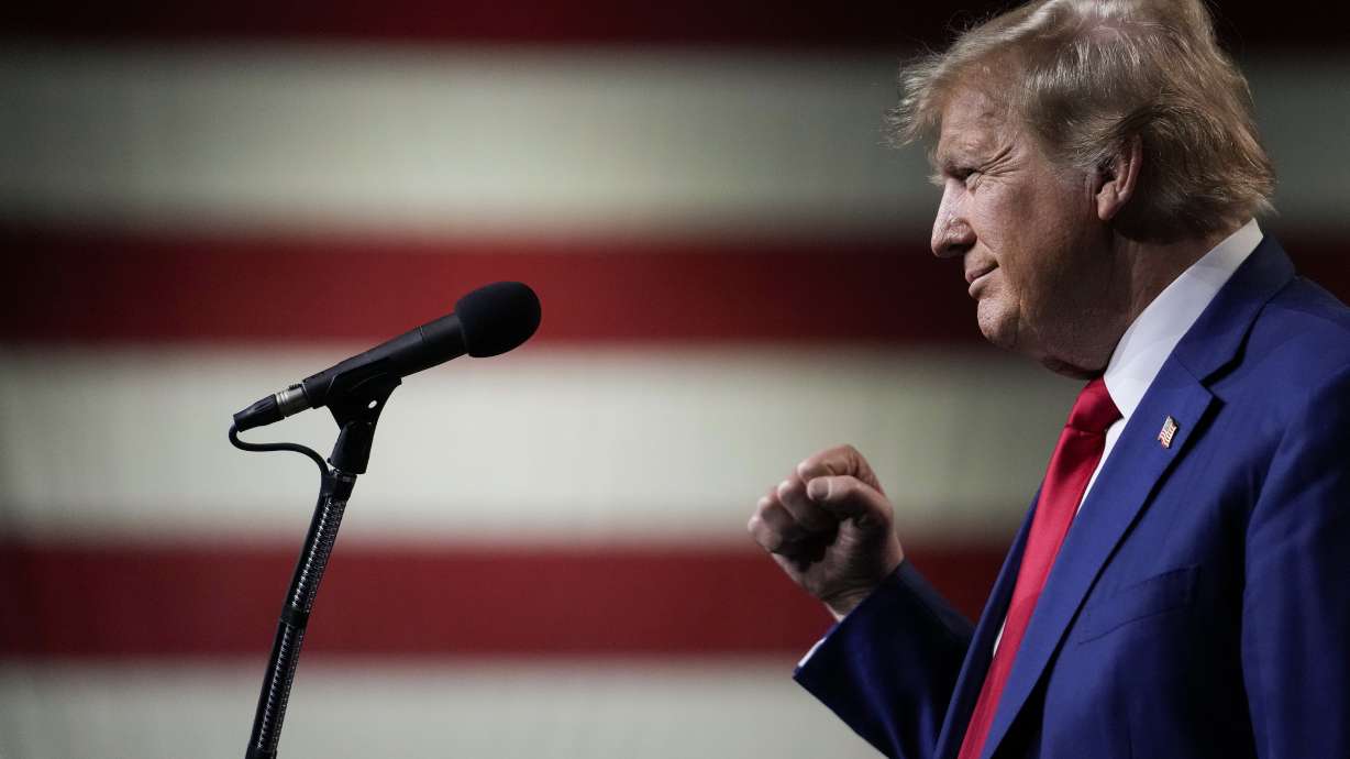 Former President Donald Trump speaks during a rally Sunday in Reno, Nevada. Utah Gov. Spencer Cox said voters should decide whether Trump can serve a second term after the Colorado Supreme Court ruled to bar him from the ballot in 2024.