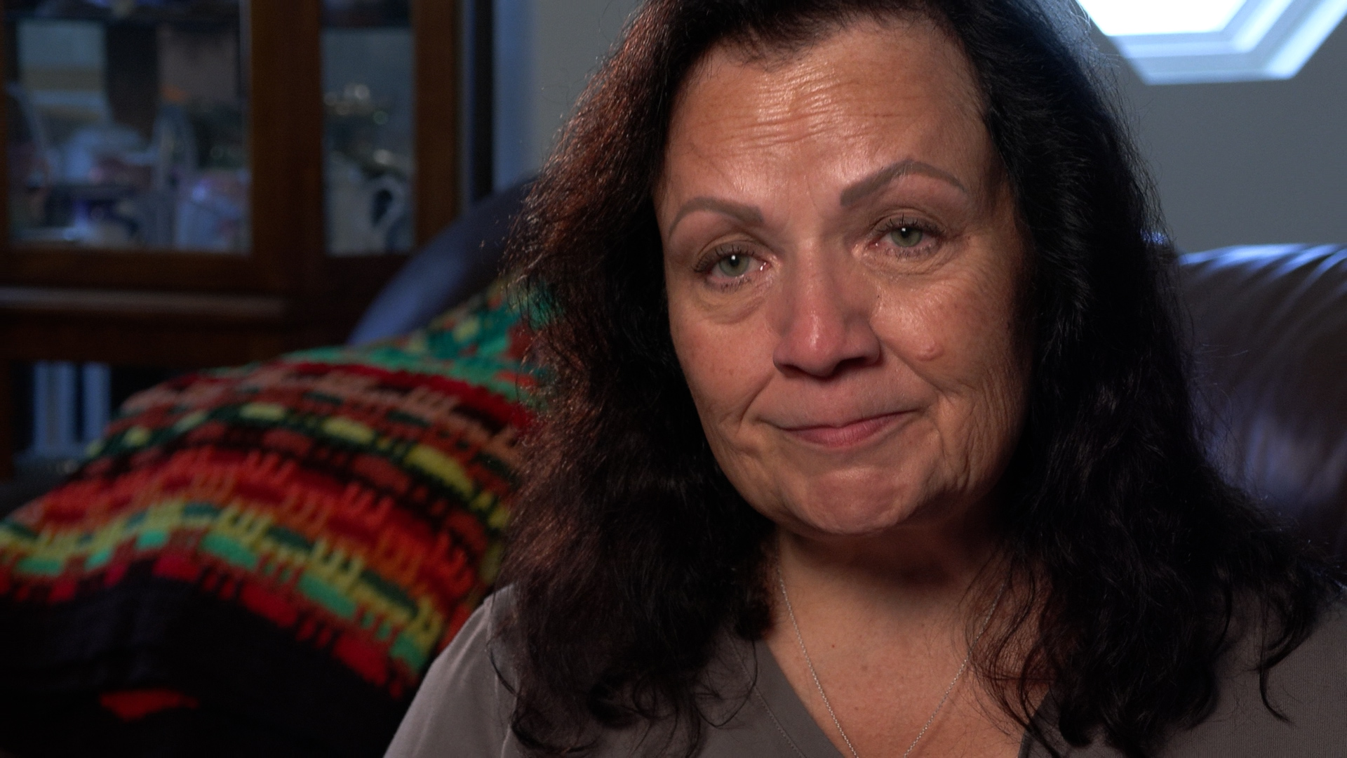 Cheryl Lasalle talks about her grandmother’s blanket in this undated photo.