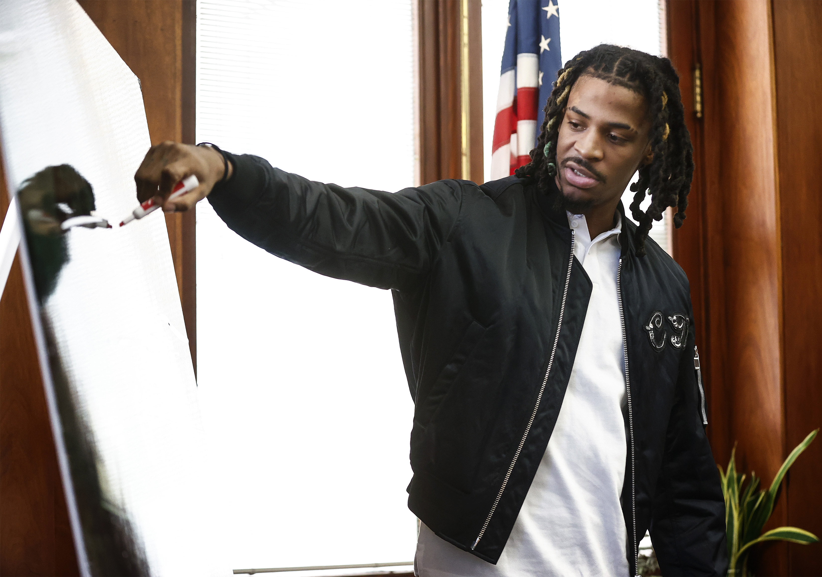 Memphis Grizzlies player Ja Morant testifies in Judge Carol Chumney's courtroom at Shelby County Circuit Court, Monday, Dec. 11, 2023, in Memphis, Tenn. The hearing is to determine whether Morant used self defense during a fight last summer at his home. 