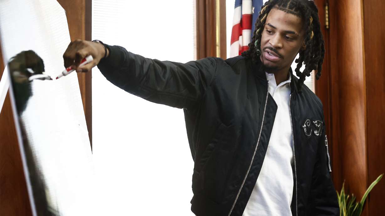 Memphis Grizzlies player Ja Morant testifies in Judge Carol Chumney's courtroom at Shelby County Circuit Court, Monday, Dec. 11, 2023, in Memphis, Tenn. The hearing is to determine whether Morant used self defense during a fight last summer at his home.