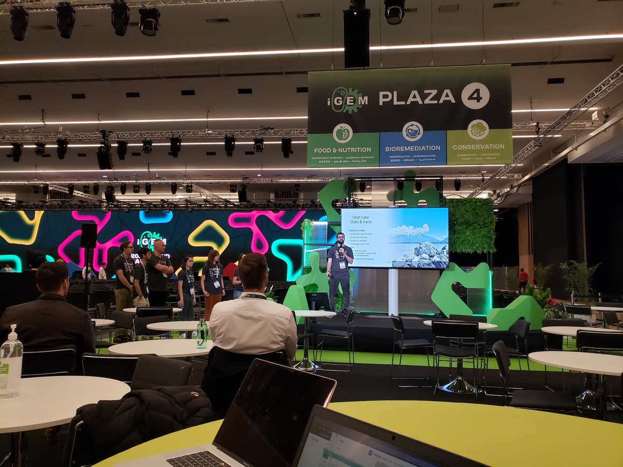 A team of UVU students present research about a genetically modified algae that soaks up toxins at the International Genetically Engineered Machine Jamboree competition in Paris in November.