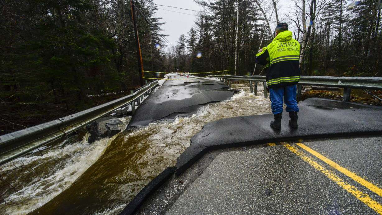 Members of the Jamaica, Vt., Fire Department look at the damage to a failed culvert for the North Branch Ball Mountain Brook on Monday, after a heavy storm dropped a couple of inches of rain. The culvert was originally replaced after the storms in July but failed again on Monday.
