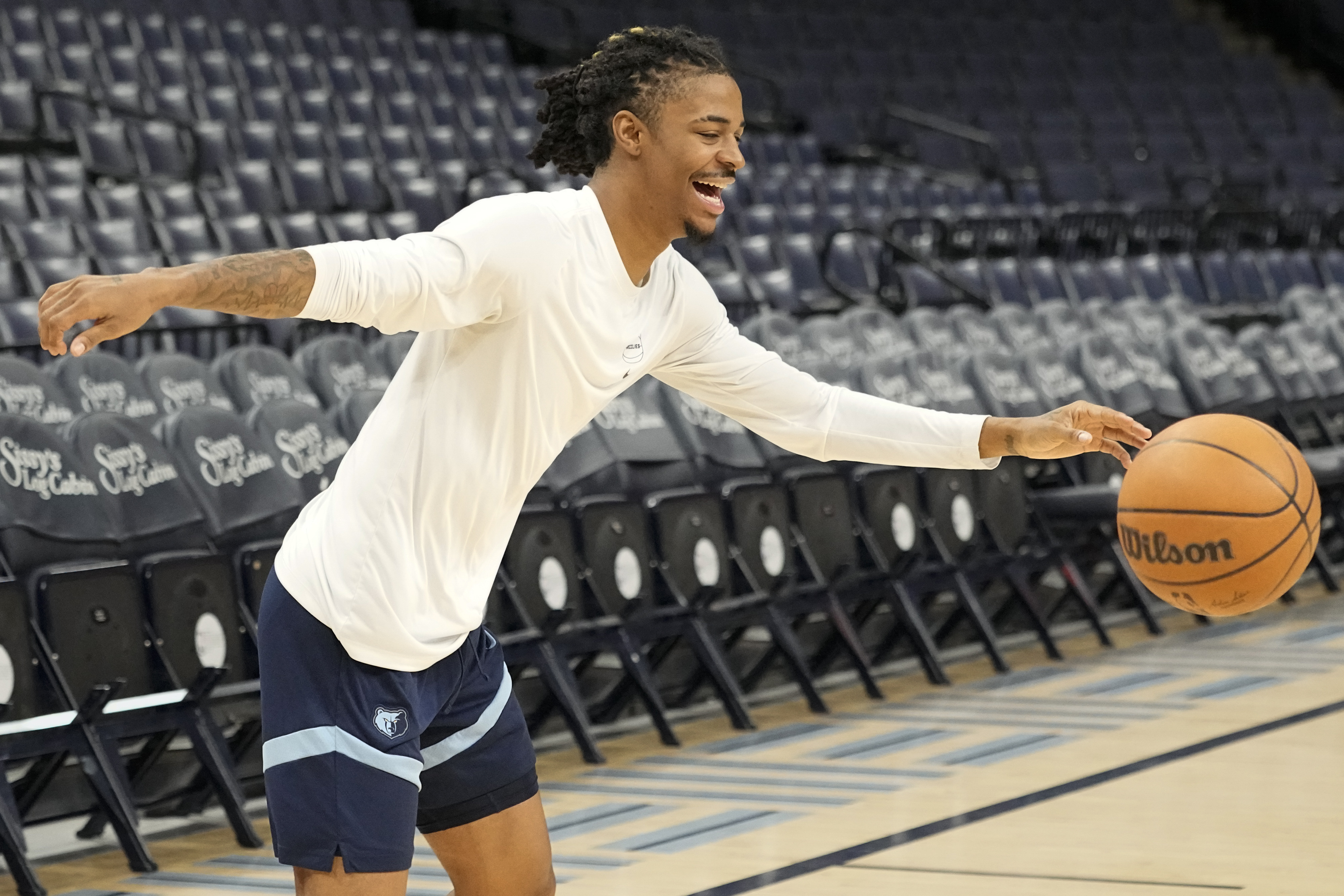 Memphis Grizzlies guard Ja Morant chases the ball during the NBA basketball team's practice Friday, Dec. 15, 2023, in Memphis, Tenn. 