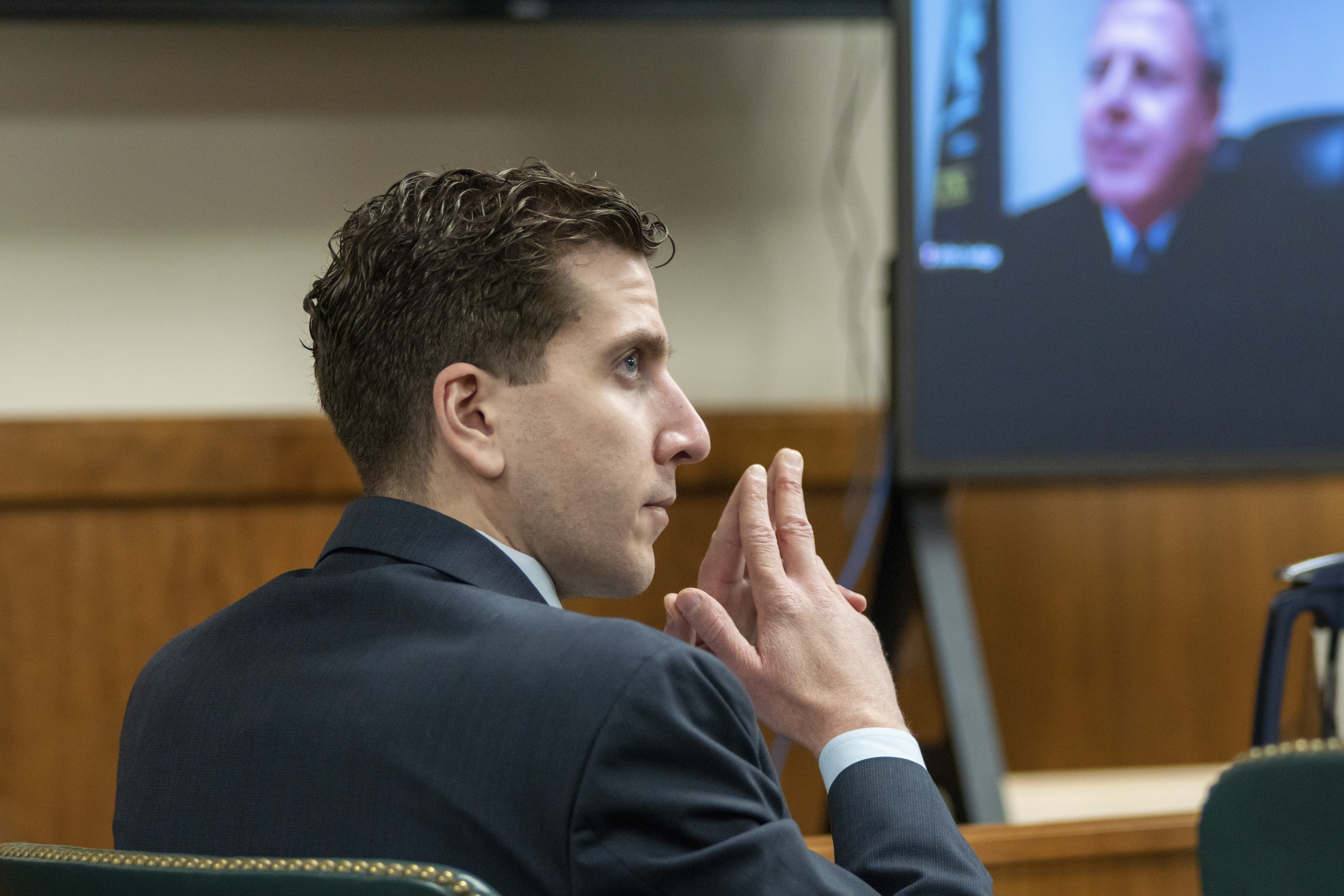 Bryan Kohberger listens to arguments during a hearing, Oct. 26, in Moscow, Idaho. Late Friday, a judge ruled that the grand jury indictment of Kohberger, who is charged with killing four University of Idaho students, was conducted properly and will stand.