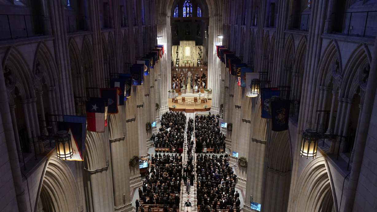 The casket of retired Supreme Court Justice Sandra Day O'Connor is escorted out of the Washington National Cathedral during a funeral service Tuesday, in Washington. O'Connor, an Arizona native and the first woman to serve on the nation's highest court, died on Dec. 1 at age 93.