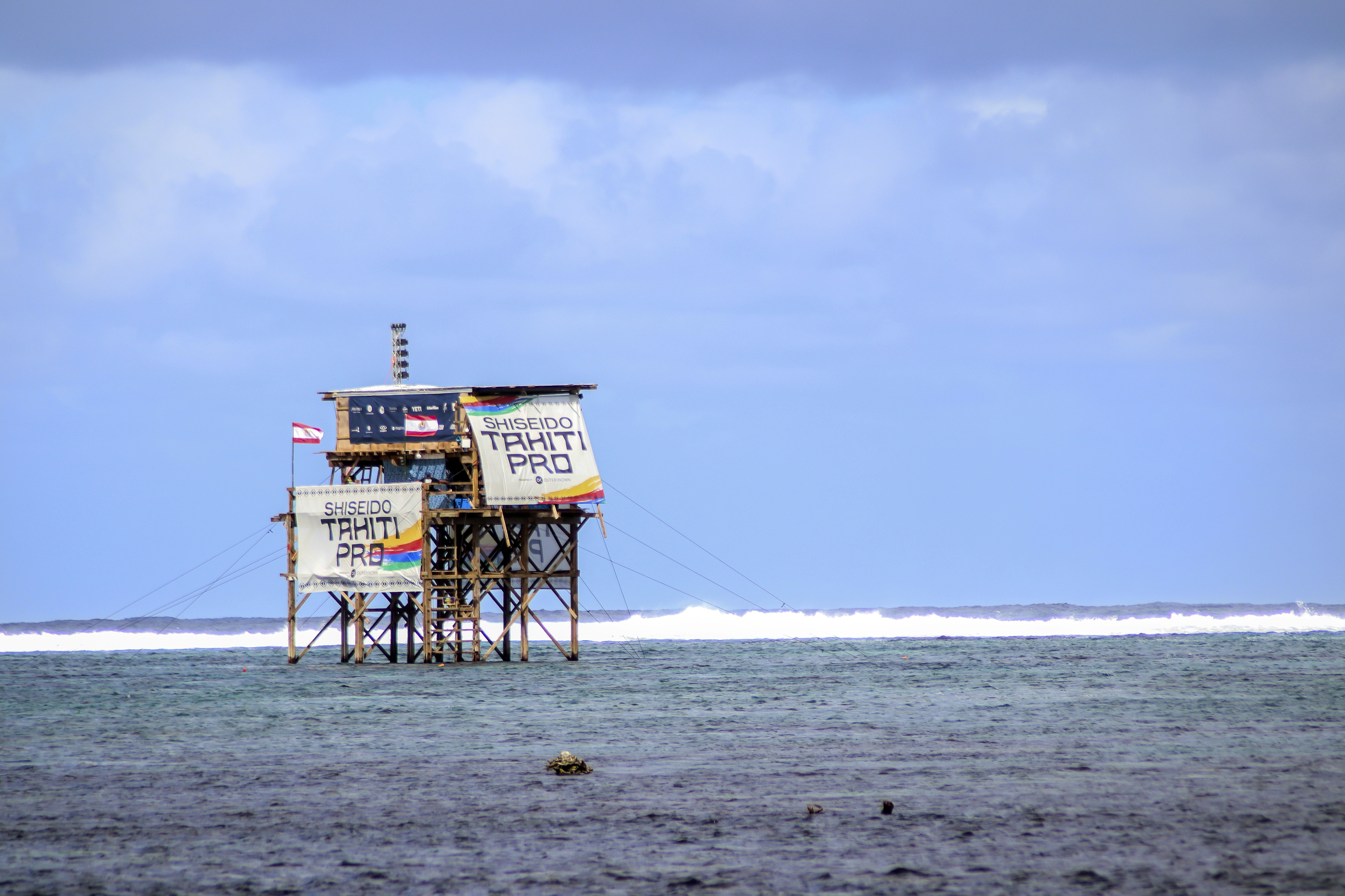 FILE - The judges' tower is pictured during the Tahiti Pro surfing competition, a test event for the Paris 2024 Olympics Games, at Teahupo'o beach, French Polynesia in the Pacific Ocean, Friday, Aug. 11, 2023. Organizers of the Paris Olympics said Wednesday Dec.20, 2023 that building work will continue on a new tower for judges and TV cameras at the surfing venue in Tahiti despite the sport's governing body saying it no longer supports the controversial project.