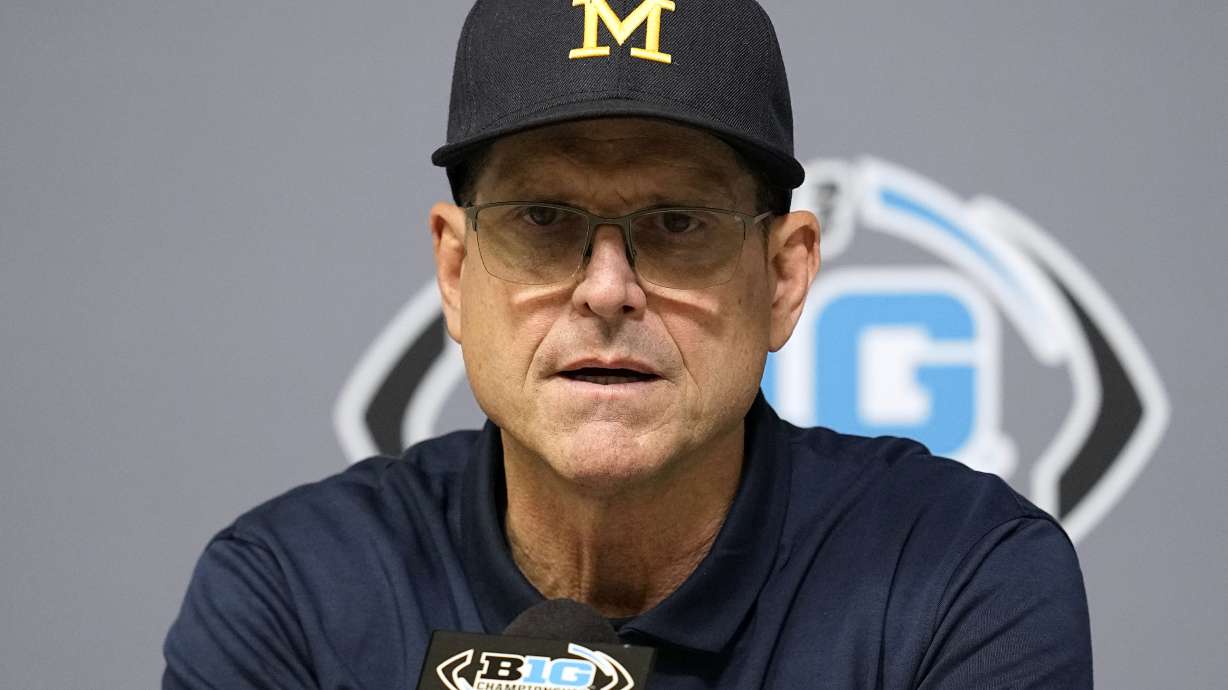 Michigan head coach Jim Harbaugh speaks during a news conference after the Big Ten championship NCAA college football game against Iowa, Sunday, Dec. 3, 2023, in Indianapolis. Michigan won 26-0.