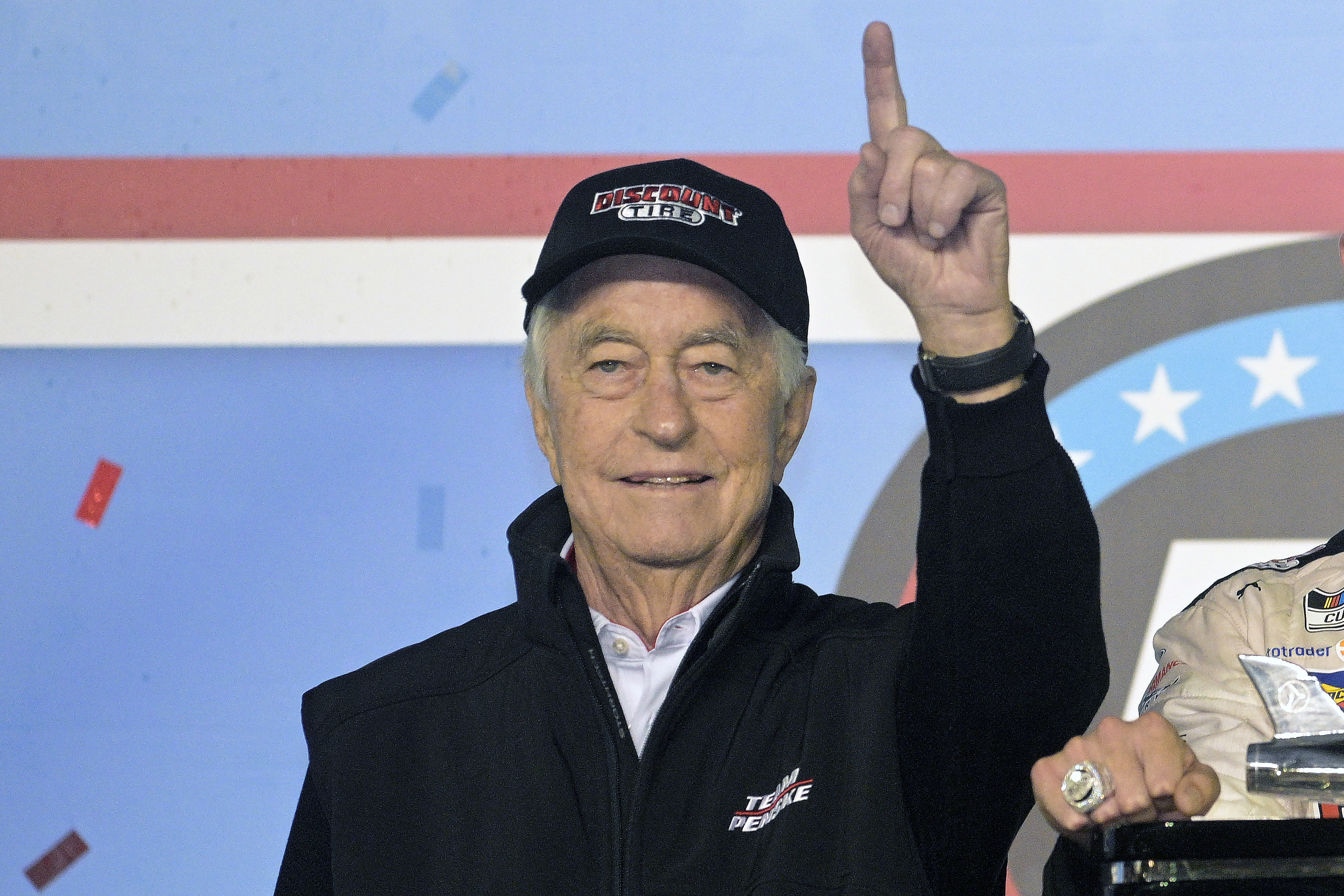 FILE - Roger Penske gestures in Victory Lane after the NASCAR Daytona 500 auto race at Daytona International Speedway in Daytona Beach, Fla., Sunday, Feb. 20, 2022. Penske has a chance for a NASCAR championship three-peat after racer Ryan Blaney won the organization's second straight series crown this year, following teammate Joey Logano's title in 2022.