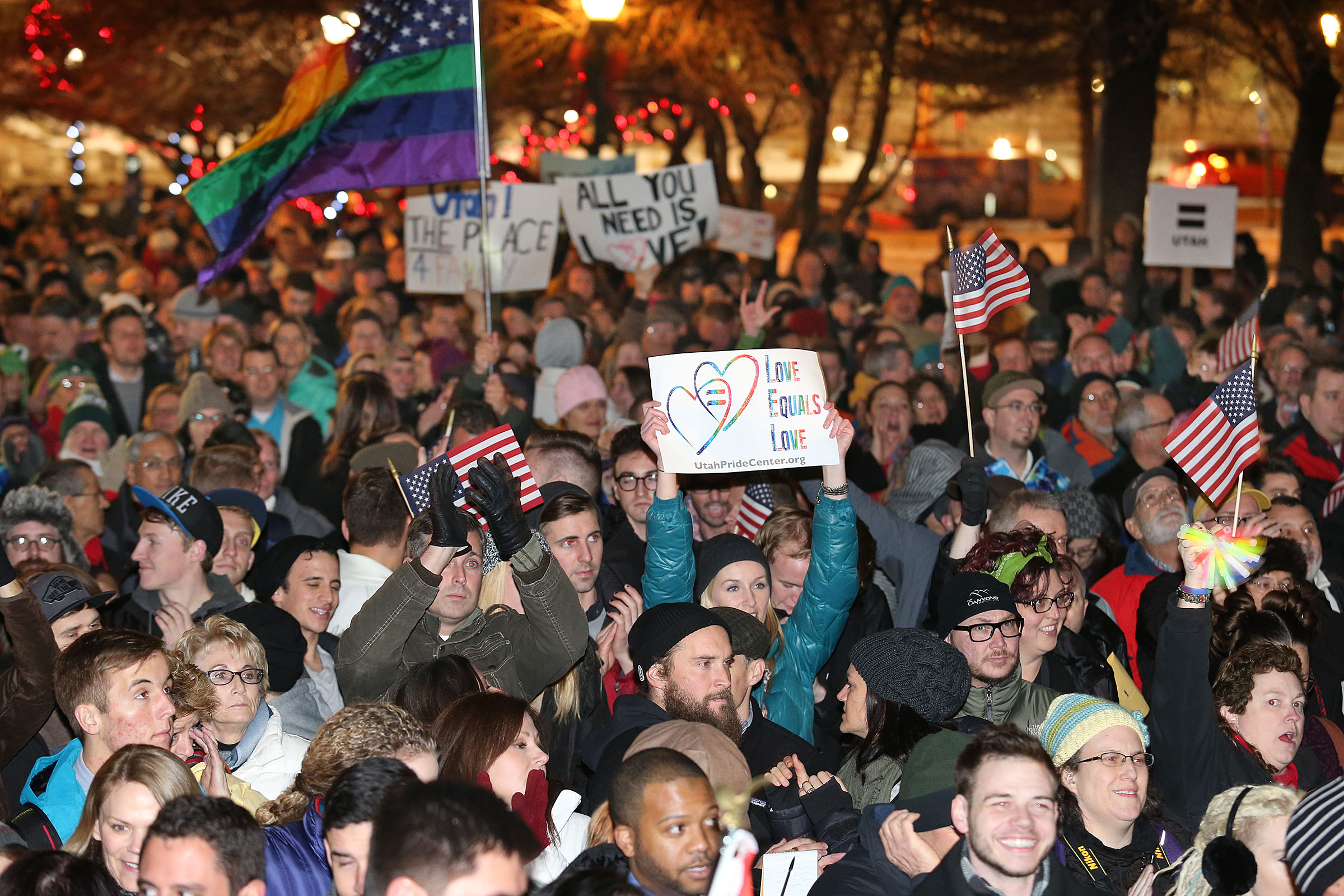 People gather at the Salt Lake City-County Building on Dec. 23, 2013, to celebrate a federal judge's decision declining  to stay his ruling that legalized same-sex marriage in Utah. Ten years later, Utah Gov. Spencer Cox says there's been a "major shift."