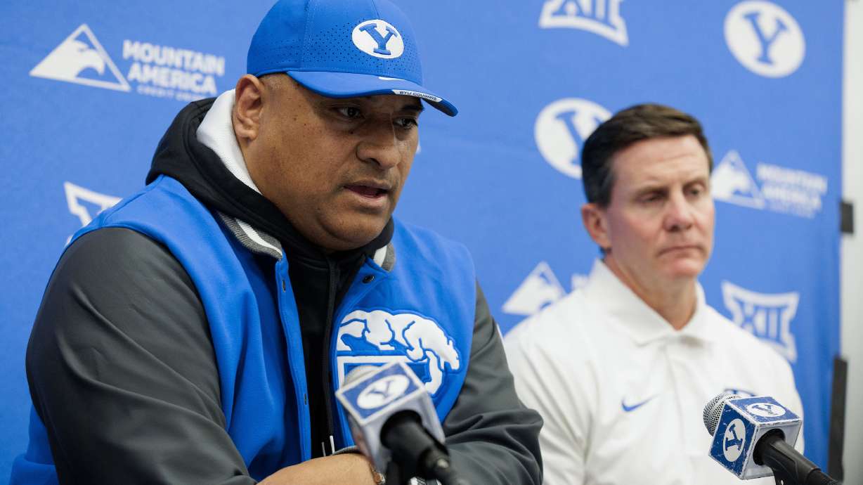 Brigham Young head coach Kalani Sitake with defensive coordinator Jay Hill on the first day of the 2024 early signing period, Wednesday, Dec. 20, 2023 on BYU's campus in Provo, Utah.