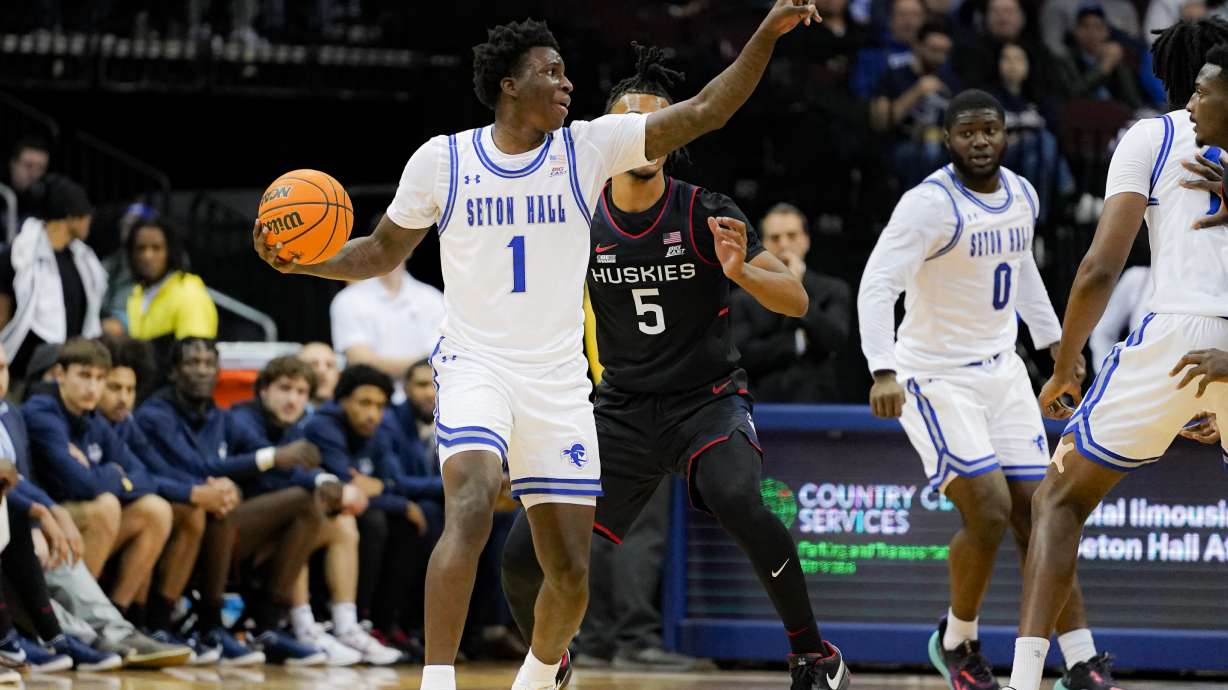 UConn guard Stephon Castle (5) defends as Seton Hall guard Kadary Richmond (1) motions to his teammates during the first half of an NCAA college basketball game against UConn in Newark, N.J., Wednesday, Dec. 20, 2023.
