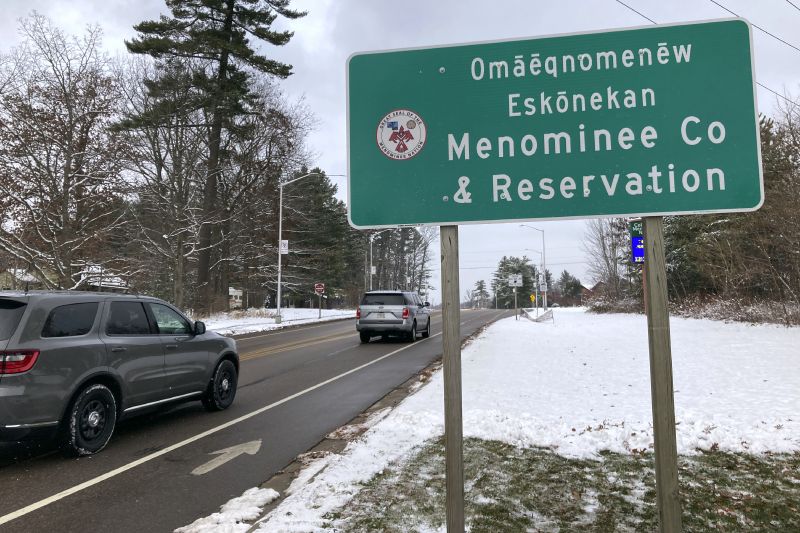 A dual-language sign for the Menominee Indian Tribe of Wisconsin was erected along Highway 47/55 in Keshena, Wis., Nov. 17, 2022.