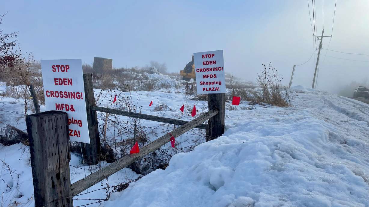 The photo, taken along state Route 158 in the Ogden Valley on Dec. 5, 2023, shows signs placed by foes of the Eden Crossing development proposal. Development has spurred some to seek incorporation of the area as a means of controlling growth.