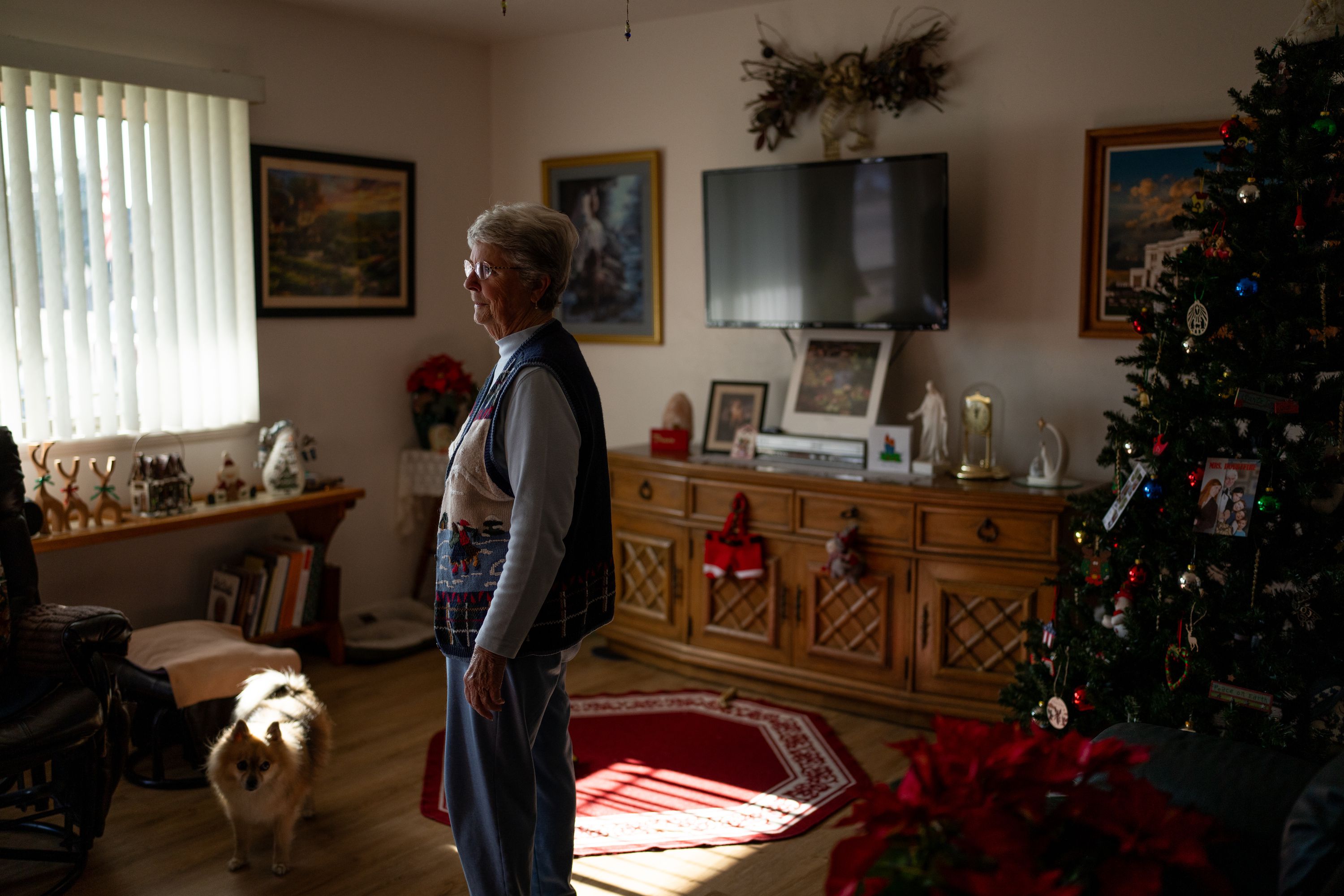 Alicia Bultez stands at her home in Santaquin on Dec. 13. The 81-year-old woman was the victim of a romance scam.