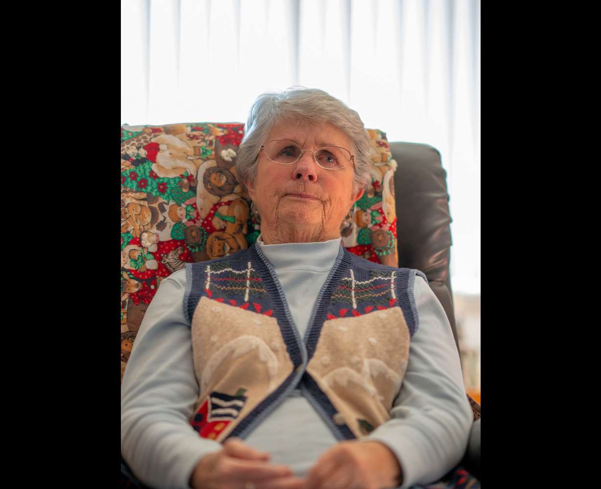 Alicia Bultez talks about the pain of being the victim of a romance scam at her home on Dec. 13.