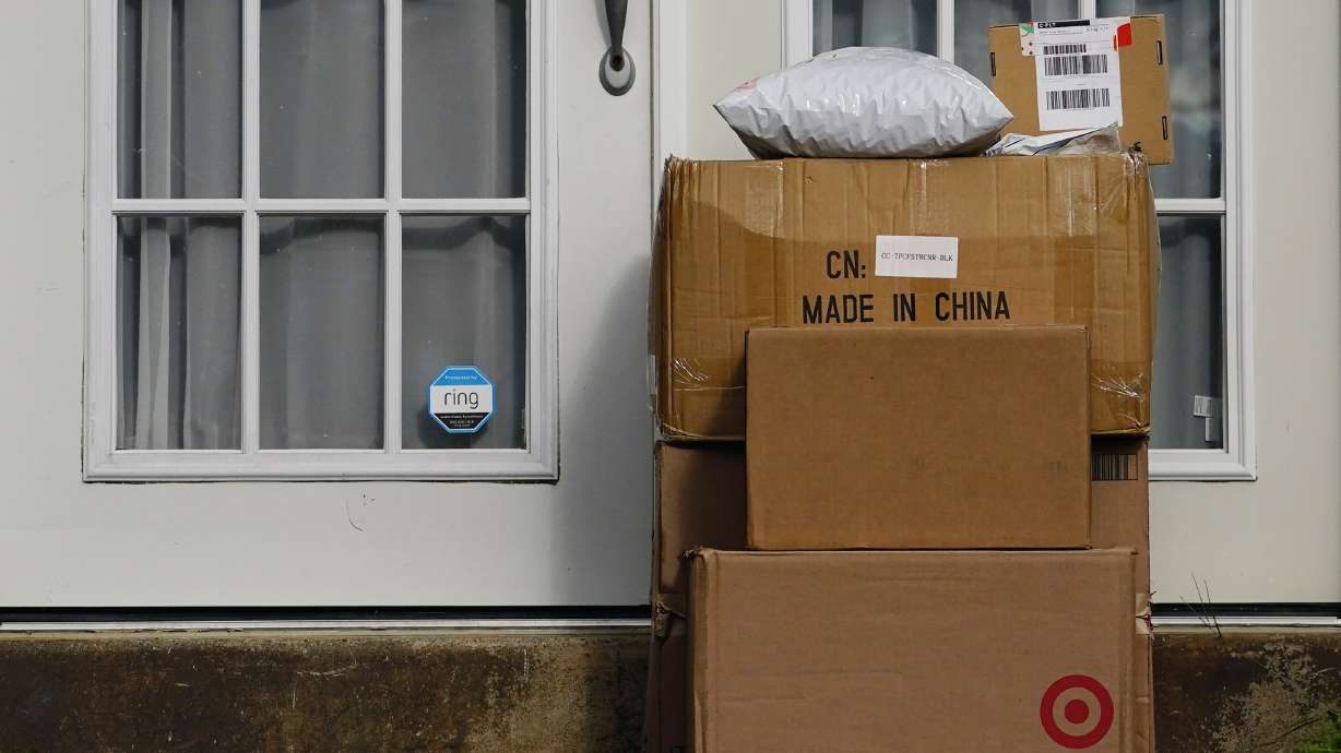 Packages on the doorstep of a home. Retailers and delivery companies have been trying to combat the theft of delivered packages in a variety of ways.