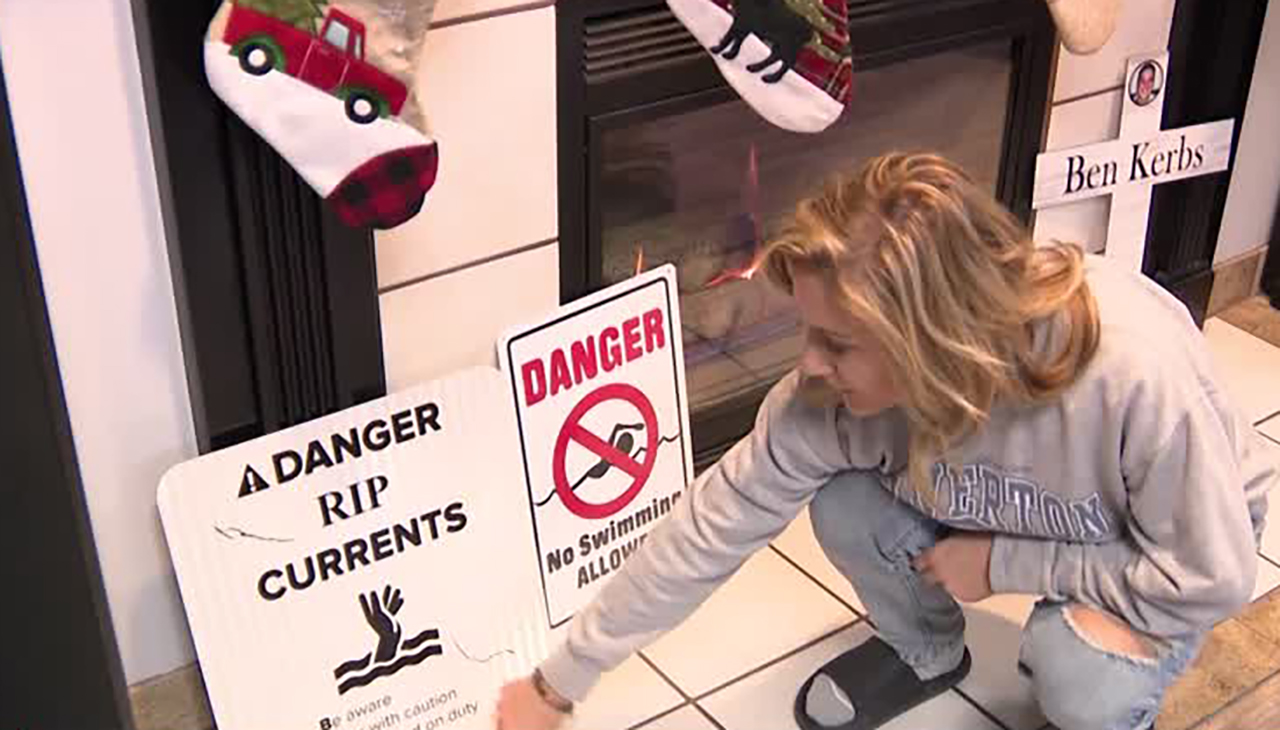 Annette Kerbs plans to place these signs at Playa Escondida Beach in Puerto Rico, warning of the dangers there. Her husband died at the beach just two months ago.