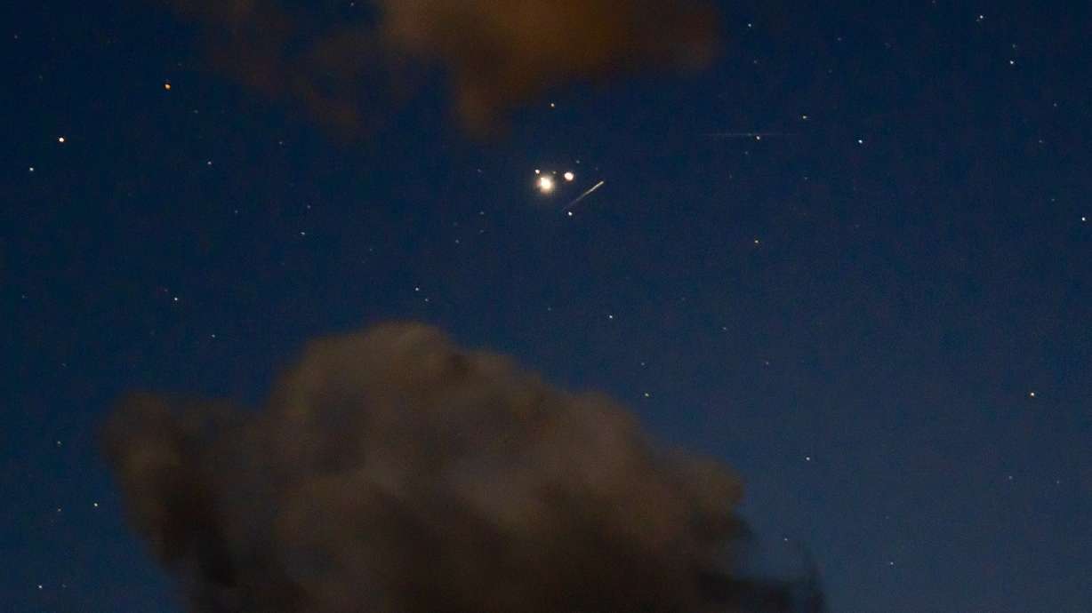 Ursid meteors are seen alongside Jupiter and Saturn's great conjunction in 2020 over Ashland, Ore. This year, the Ursids will peak on Thursday night through the early morning of Friday.