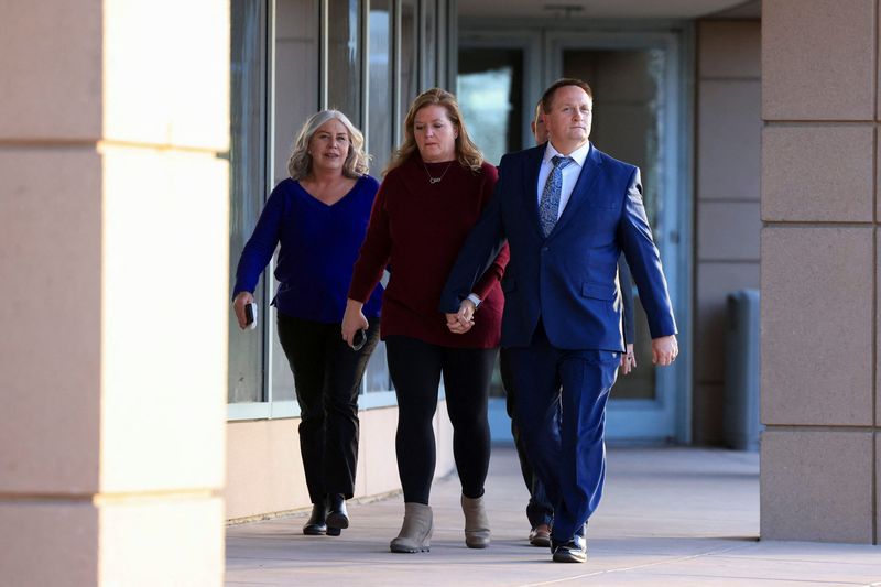 Paramedic Jeremy Cooper leaves the Adams County District Court while a jury deliberates in a trial where he and another paramedic are accused in the death of Elijah McClain, in Brighton, Colorado, Friday. 