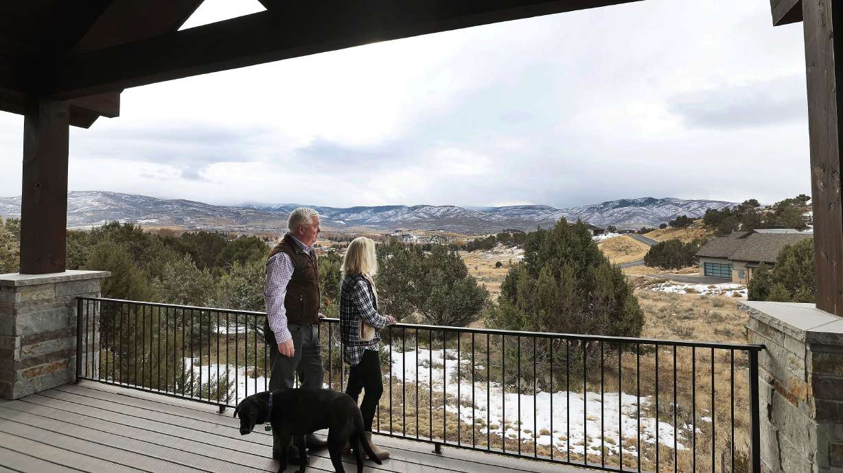 George Glass, former U.S. ambassador to Portugal, and his wife, Mary, look over the view at their home in Heber City on Wednesday. George Glass, a Catholic, supports construction of a Latter-day Saint temple near his home.