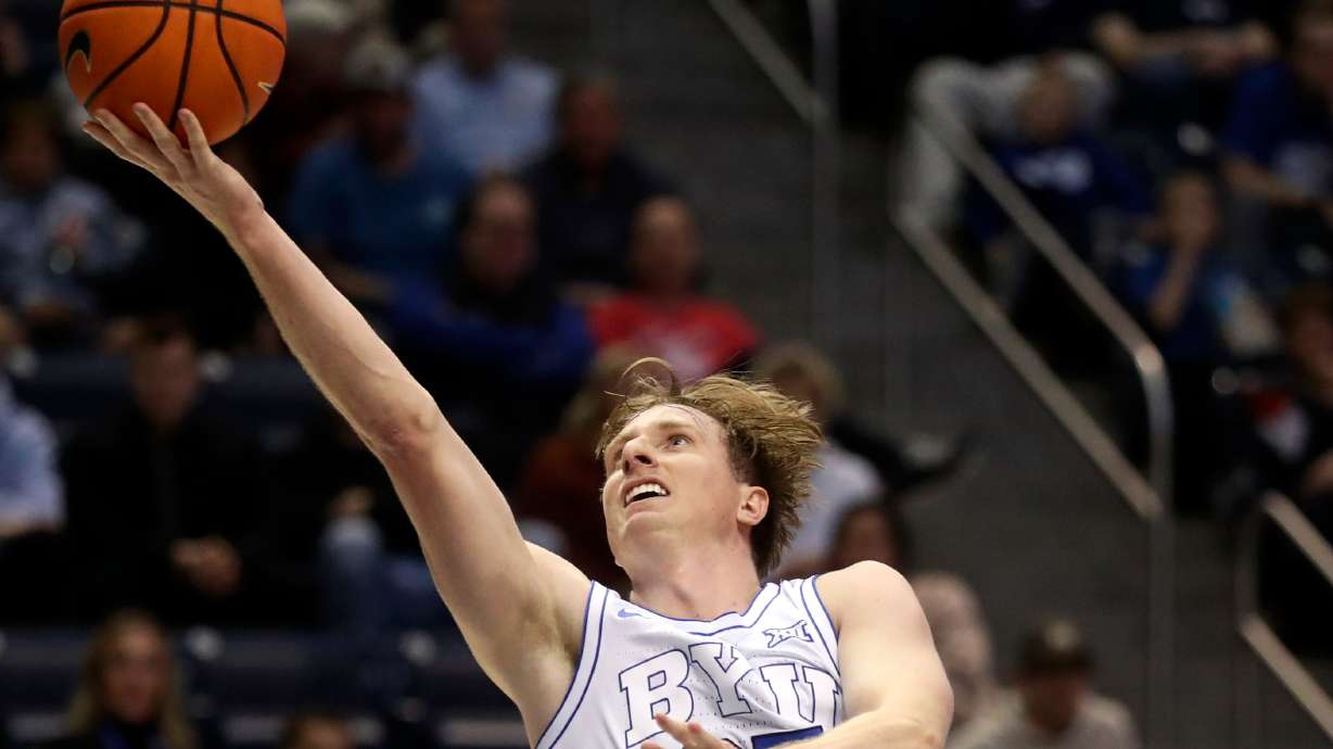 Brigham Young guard Dawson Baker (25) shoots during a men’s basketball game against the Bellarmine Knights at the Marriott Center in Provo on Friday, Dec. 22, 2023. BYU won 101-59.