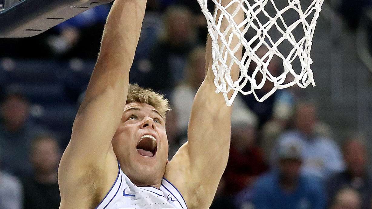 Brigham Young Cougars guard Dallin Hall (30) dunks the ball during a men’s basketball game against the Bellarmine Knights at the Marriott Center in Provo on Friday, Dec. 22, 2023. BYU won 101-59.