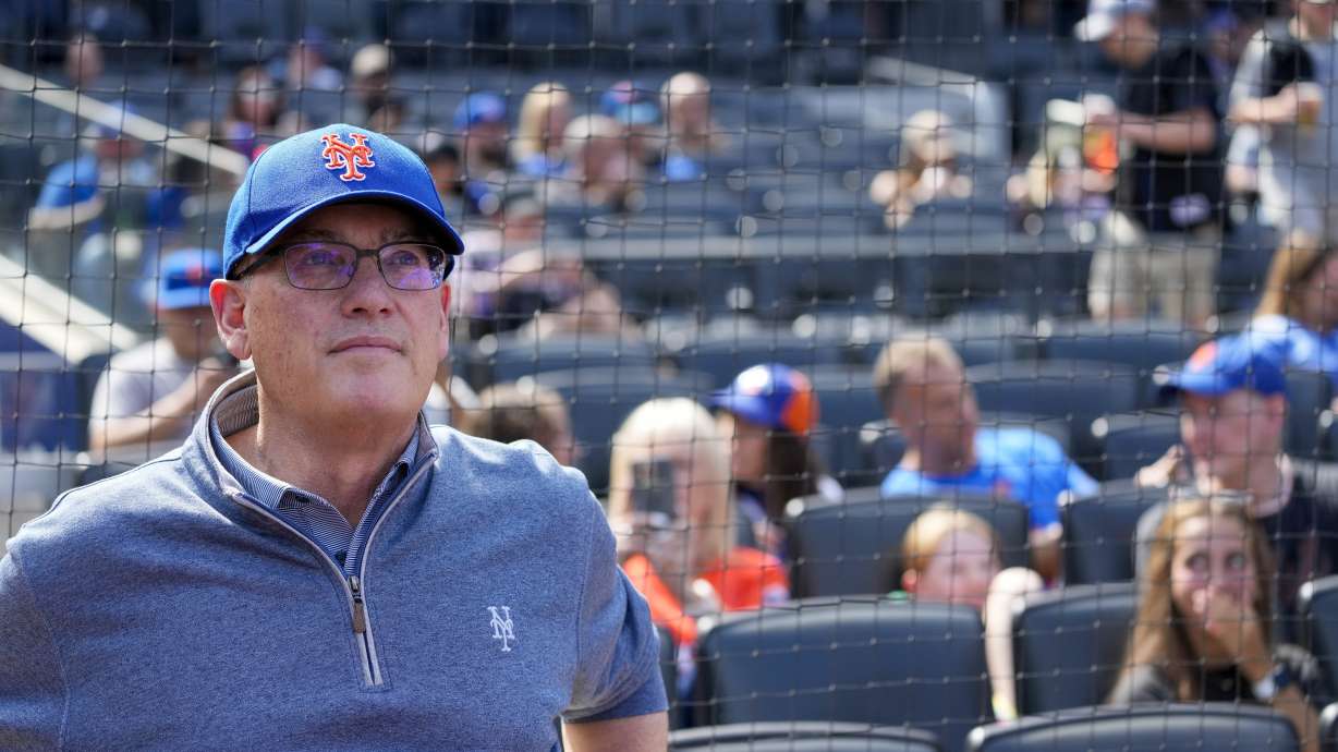 FILE - New York Mets owner Steve Cohen looks on before the start of a baseball game between the New York Mets and the Cincinnati Reds, Sunday, Sept. 17, 2023, in New York. Cohen's Mets finished with a tax payroll of $374.7 million, according to figures finalized by Major League Baseball on Thursday, Dec. 21, and obtained by The Associated Press. That topped the previous high of $291.1 million by the 2015 Los Angeles Dodgers.