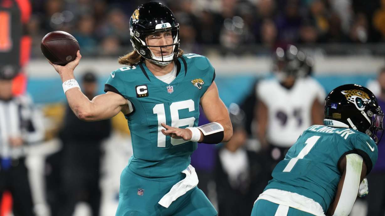 Jacksonville Jaguars quarterback Trevor Lawrence (16) passes against the Baltimore Ravens in the first half of an NFL football game Sunday, Dec. 17, 2023, in Jacksonville, Fla.