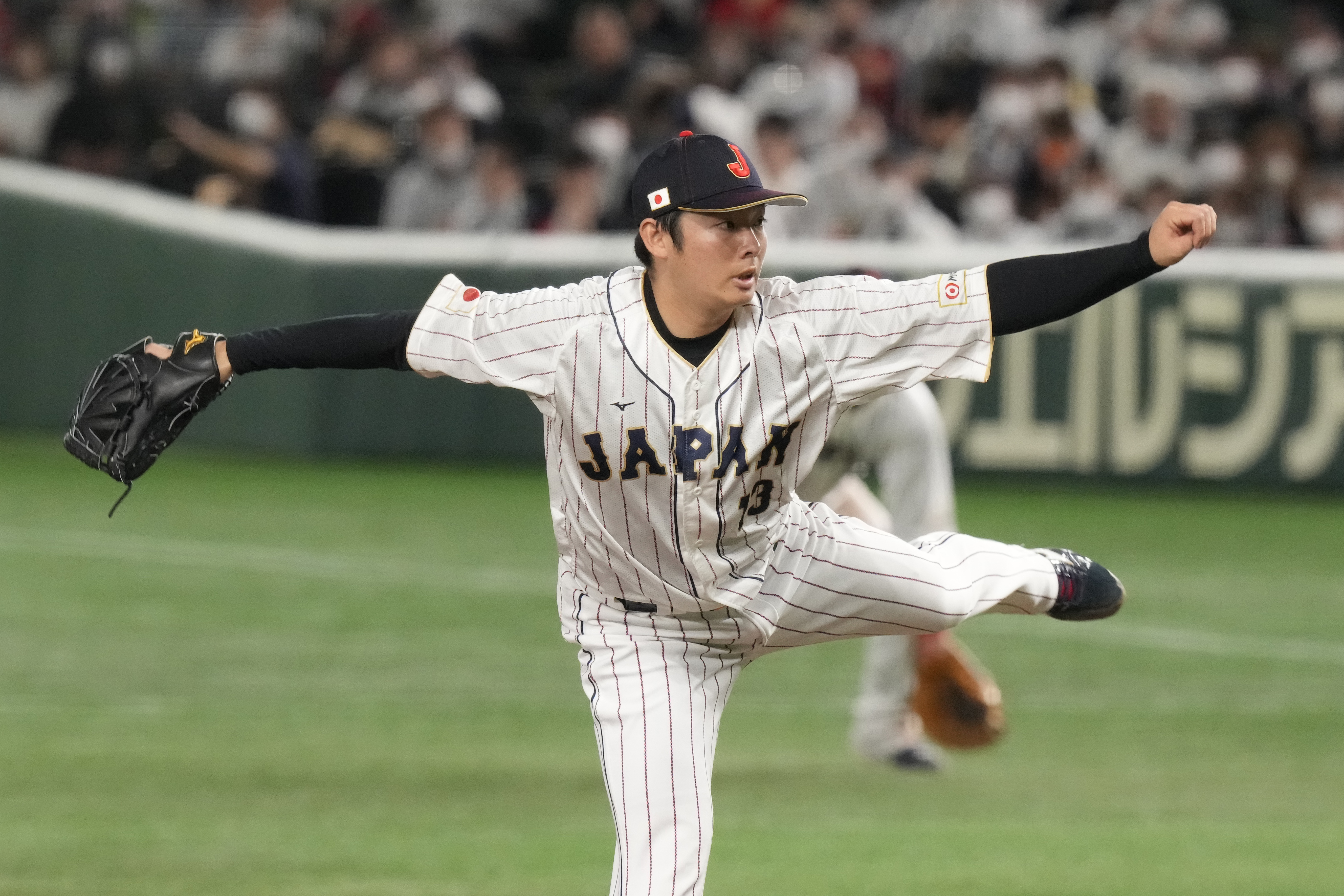 Japan relief pitcher Yuki Matsui throws during the eighth inning of the first round Pool B game between South Korea and Japan at the World Baseball Classic at Tokyo Dome in Tokyo on March 10, 2023. Matsui agreed Saturday, Dec. 23, to a five-year contract with the San Diego Padres. The 28-year-old left-hander was a five-time All-Star in Japan for the Tohoku Rakuten Golden Eagles, leading the Pacific League in saves in 2019, 2022 and this year.