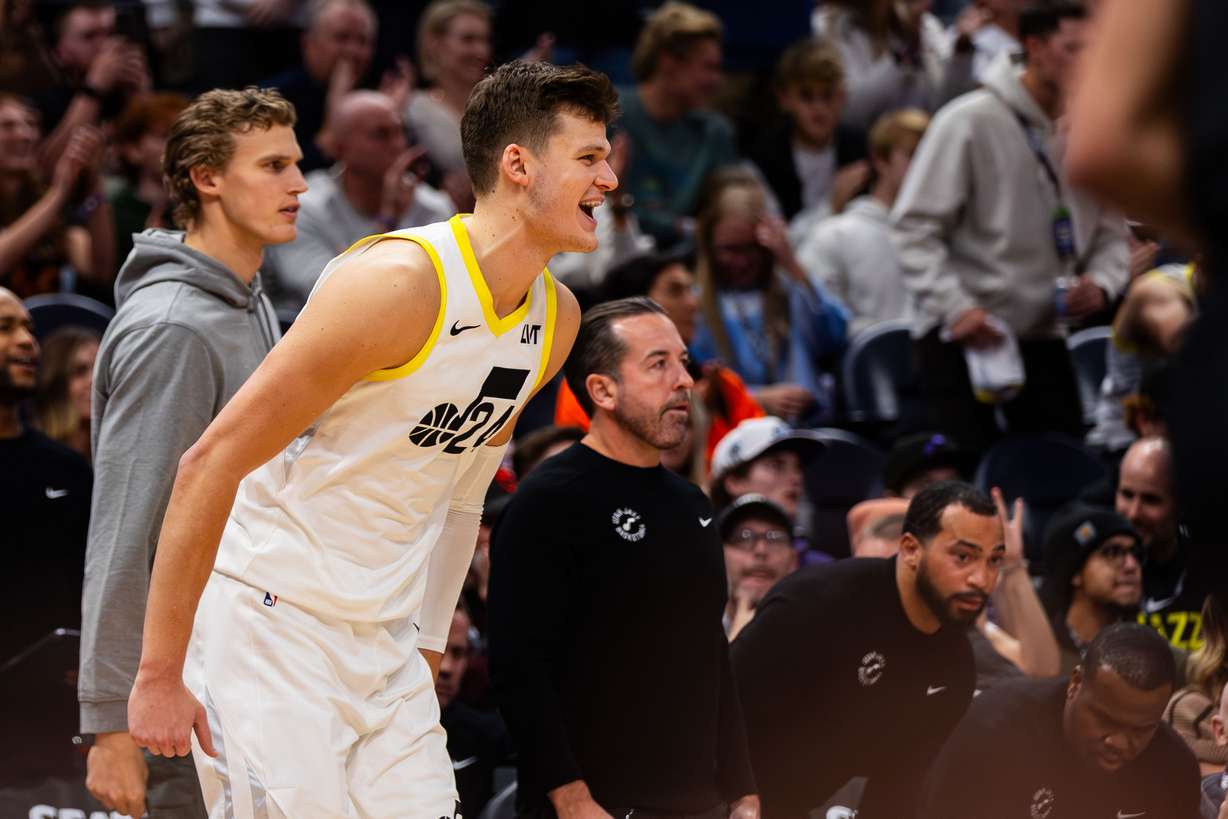 Utah Jazz center Walker Kessler (24) cheers from the sidelines during a great fourth quarter for the Jazz during an NBA basketball game between the Utah Jazz and the New Orleans Pelicans at the Delta Center in Salt Lake City on Saturday, Nov. 25, 2023.