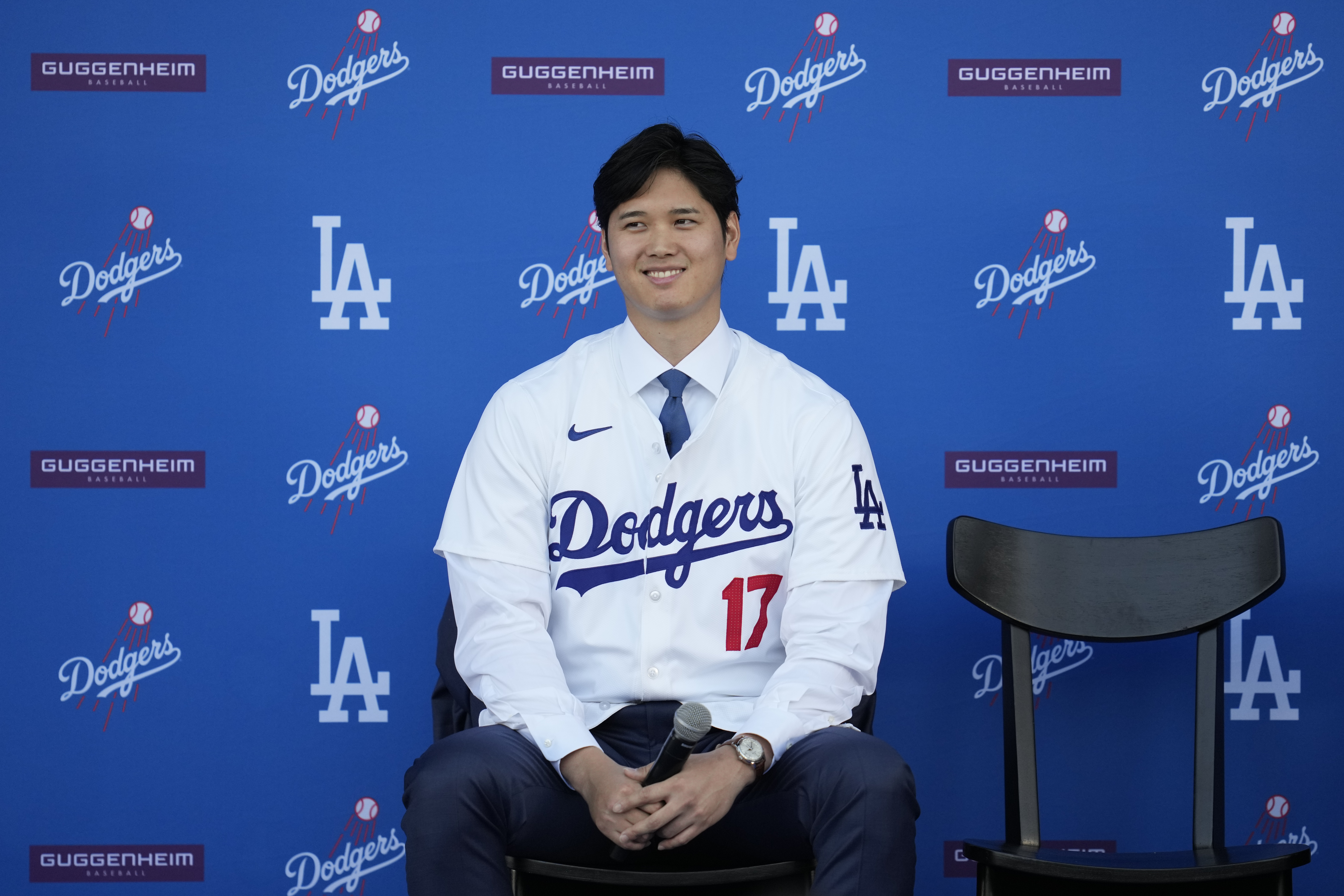 Los Angeles Dodgers' Shohei Ohtani answers questions during a baseball news conference at Dodger Stadium Thursday, Dec. 14, 2023, in Los Angeles.