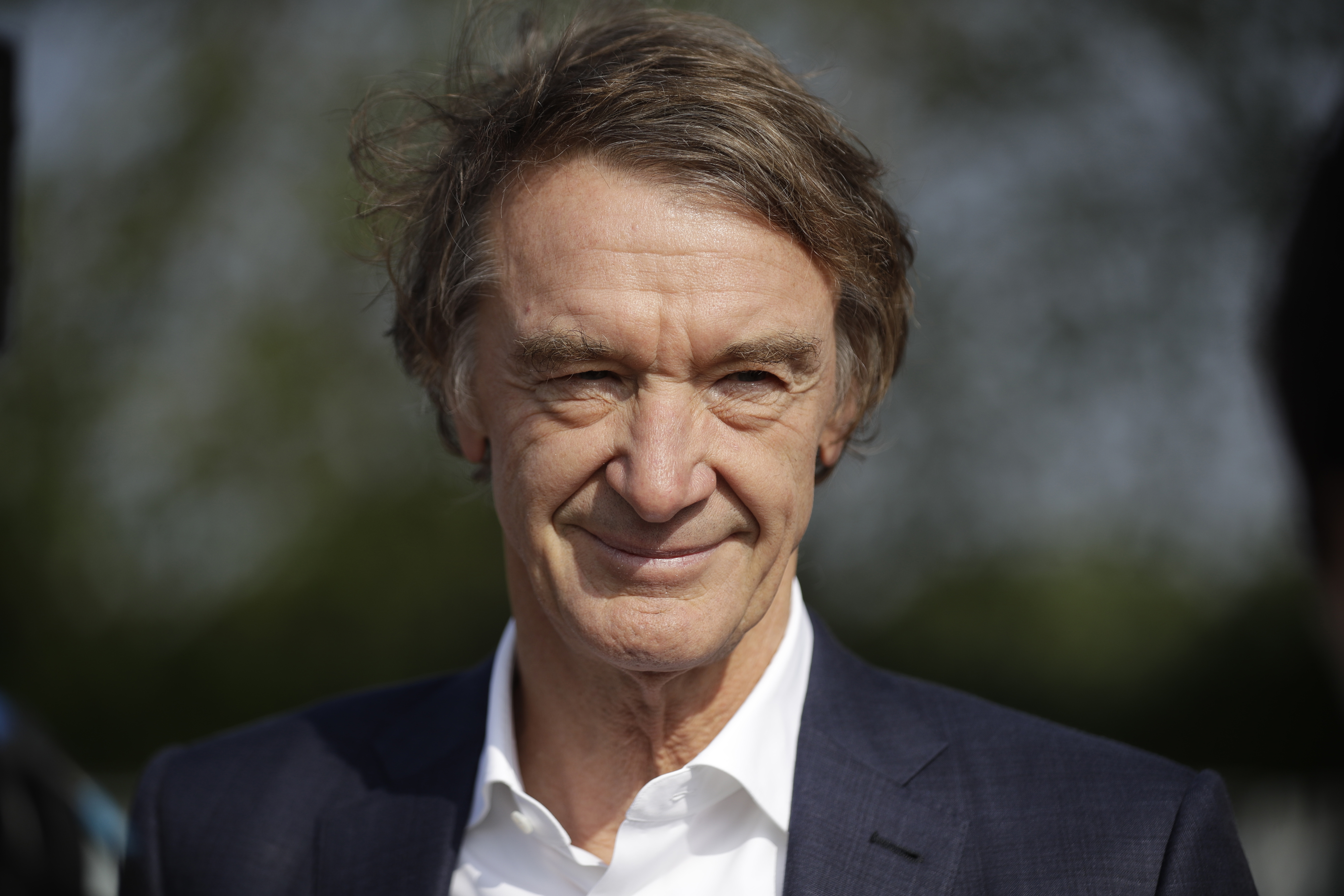 FILE - British billionaire Jim Ratcliffe, the founder of the INEOS Chemicals company, is interviewed by The Associated Press at the Iffley Road Track, in Oxford, England, April 30, 2019. British billionaire Jim Ratcliffe has finally got his hands on Manchester United after securing a stake of up to 25% in the Premier League club. His investment in United — with the club confirming a deal on Sunday Dec. 24. 2023. subject to Premier League approval — comes after moves elsewhere in European soccer that could have seen him take control of one of United’s main Premier League rivals as recently as last year. 