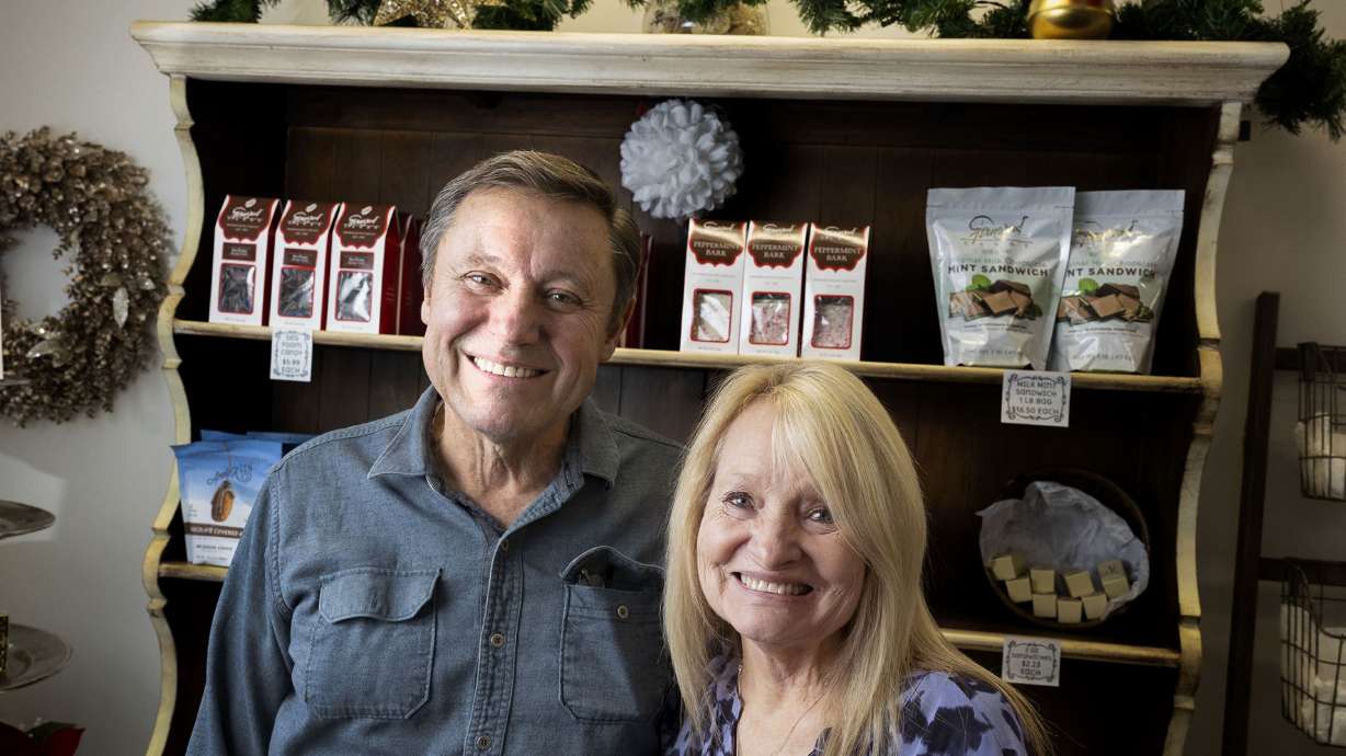 Mike and Linda Staheli, owners of Fernwood Candy, are photographed at Fernwood Candy Company in Logan on Nov. 30.