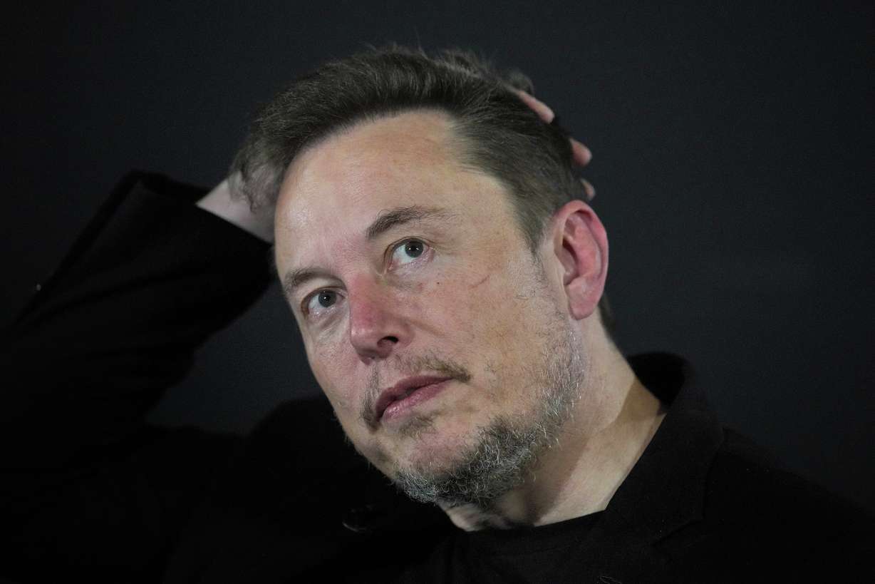 Elon Musk reacts during an in-conversation event with Britain's Prime Minister Rishi Sunak in London, on Nov. 2. A little more than a year ago, Musk walked into Twitter's San Francisco headquarters, fired its CEO and other top executives and began transforming the social media platform into what's now known as X.