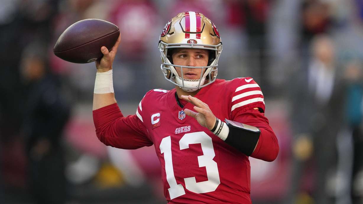 San Francisco 49ers quarterback Brock Purdy (13) warms up before an NFL football game against the Arizona Cardinals Sunday, Dec. 17, 2023, in Glendale, Ariz.