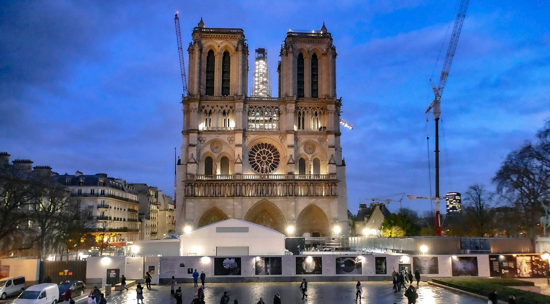 The new rooster is added to the top of Notre Dame cathedral in Paris on Dec. 16, as rebuilding continues after a catastrophic fire in 2019. While the spire is still currently encased in scaffolding, the 860-year-old building is set to reopen in 2024.