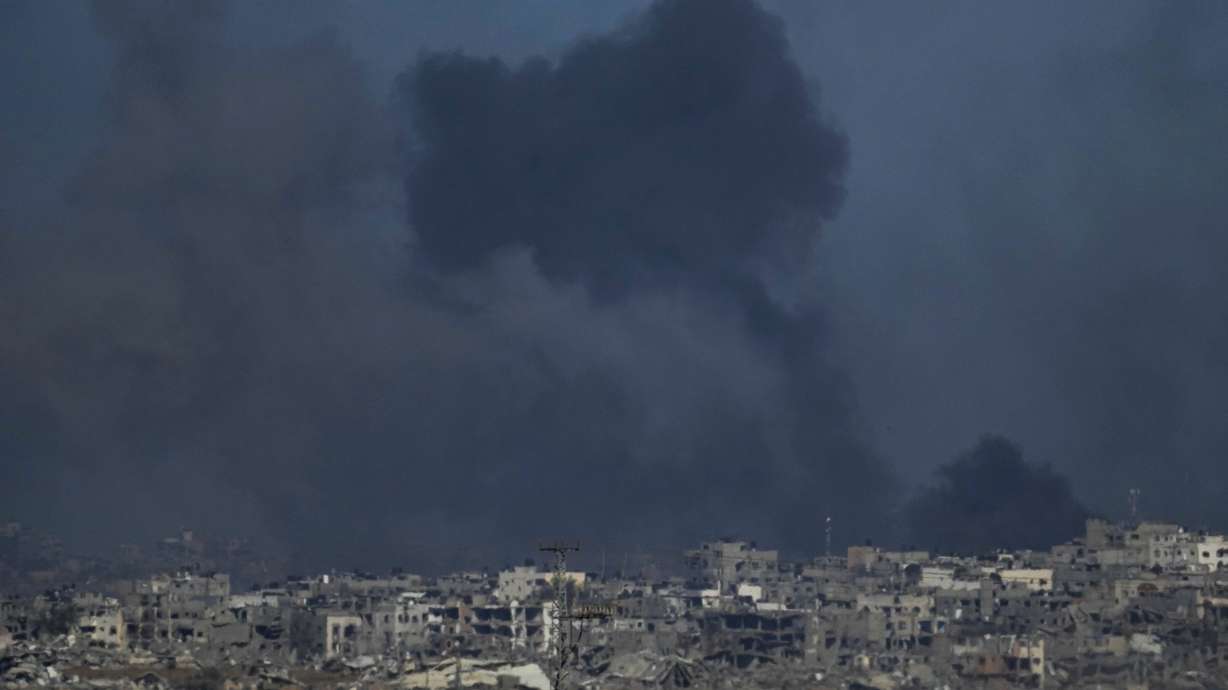 Smoke rises following an Israeli bombardment in the Gaza Strip, as seen from southern Israel on Dec. 26. The army is battling Palestinian militants across Gaza in the war ignited by Hamas' Oct. 7 attack into Israel.