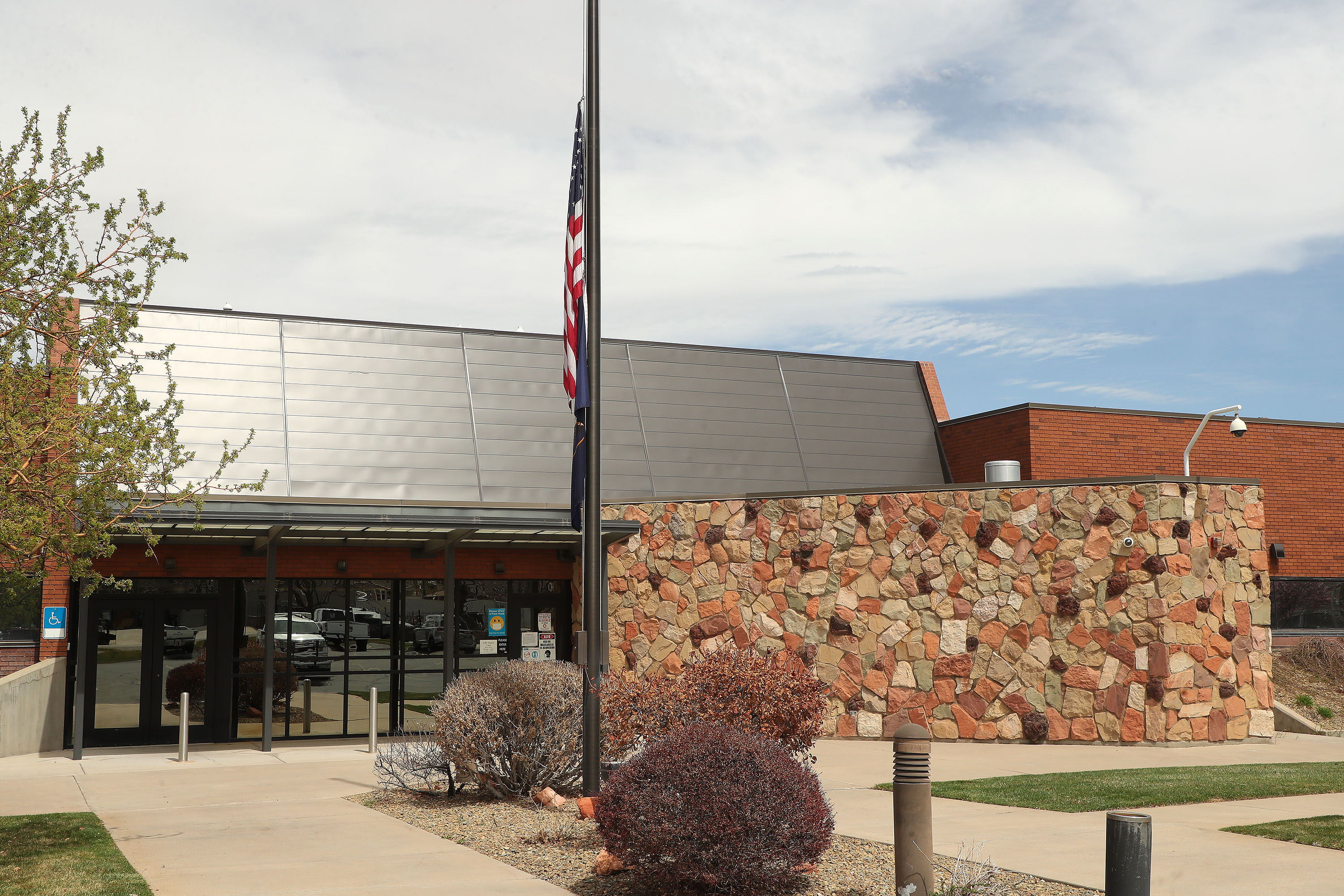 Two Cedar City roommates were charged Monday with murder and accused of gunning down a 17-year-old girl as she was driving a truck. Two other roommates were charged with obstructing justice.