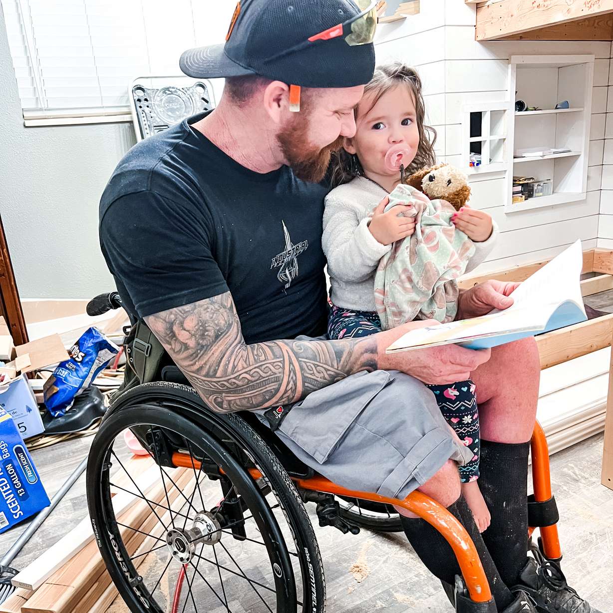 Dan Kotter, of West Haven, who is paralyzed from the waist down, recently built a bedroom for his two youngest daughters.