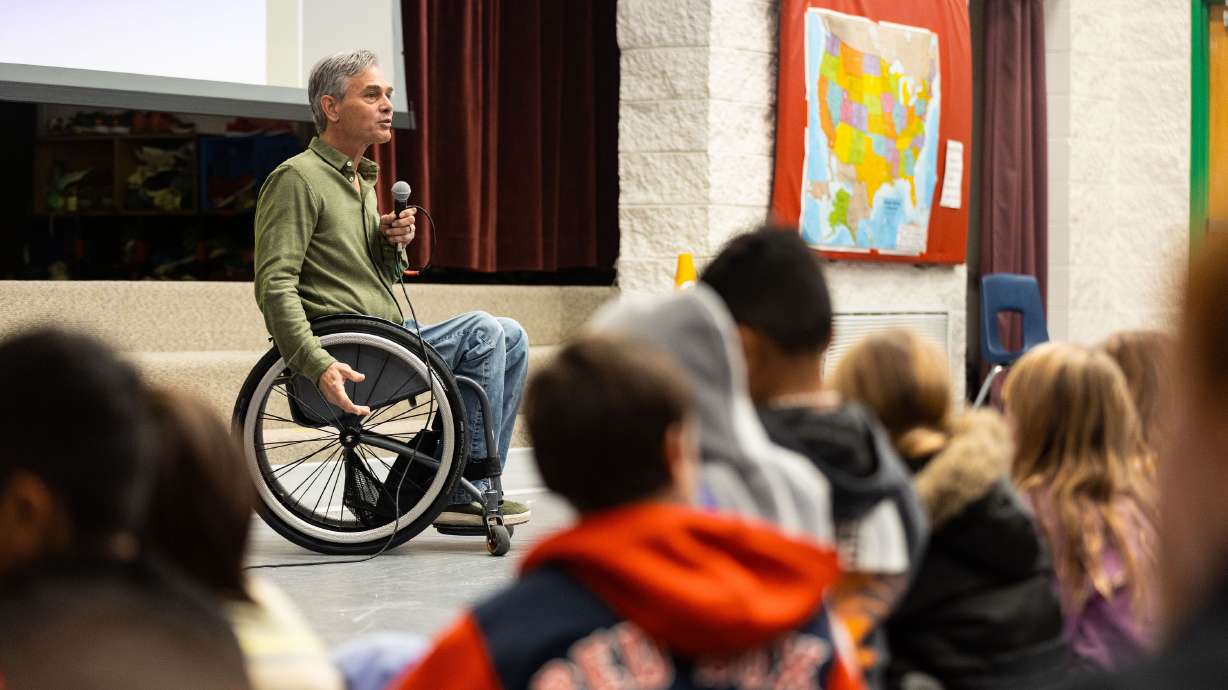Chris Waddell, a former Paralympian, speaks to students at McPolin Elementary in Park City on Dec. 12. He presented his program “Nametags.”