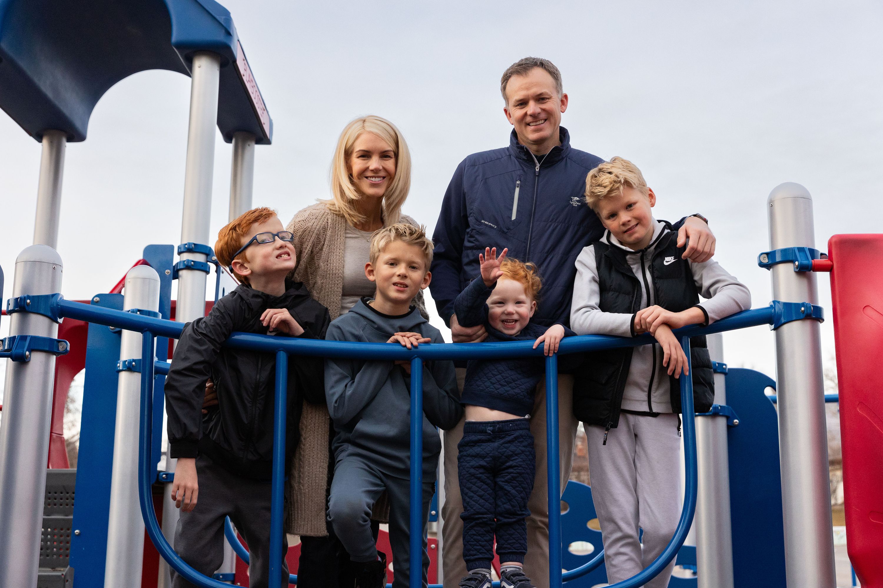 Rep. Blake Moore, R-Utah, and his family, from left, Winston, 8; Jane, his wife; George, 8; Franklin, 2; and Max, 11, pose for a portrait at Dilworth Elementary School in Salt Lake City on Friday.