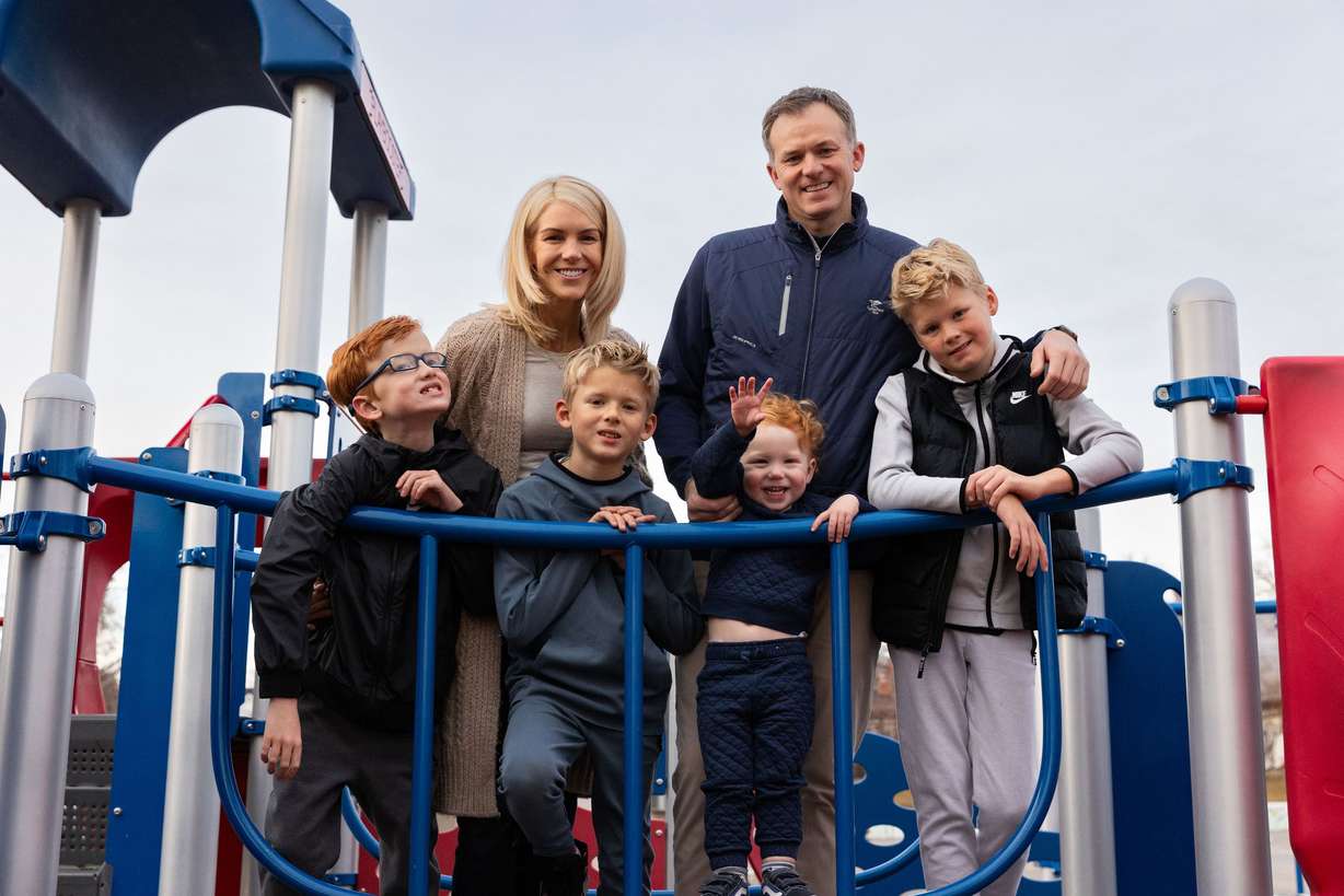 Rep. Blake Moore, R-Utah, and his family, from left, Winston, 8; Jane, his wife; George, 8; Franklin, 2; and Max, 11, pose for a portrait at Dilworth Elementary School in Salt Lake City on Friday.